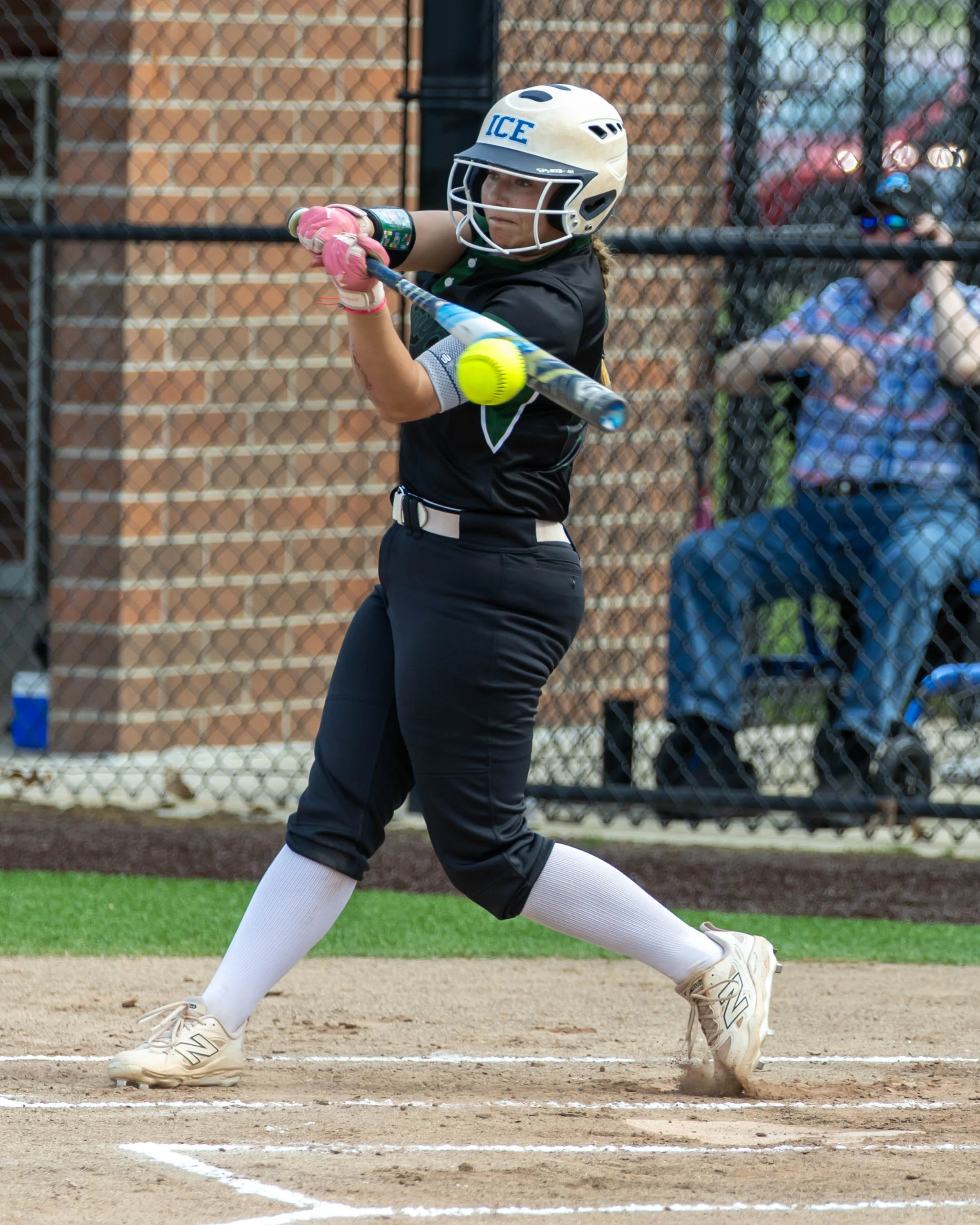 Kettering #27 with ball on bat