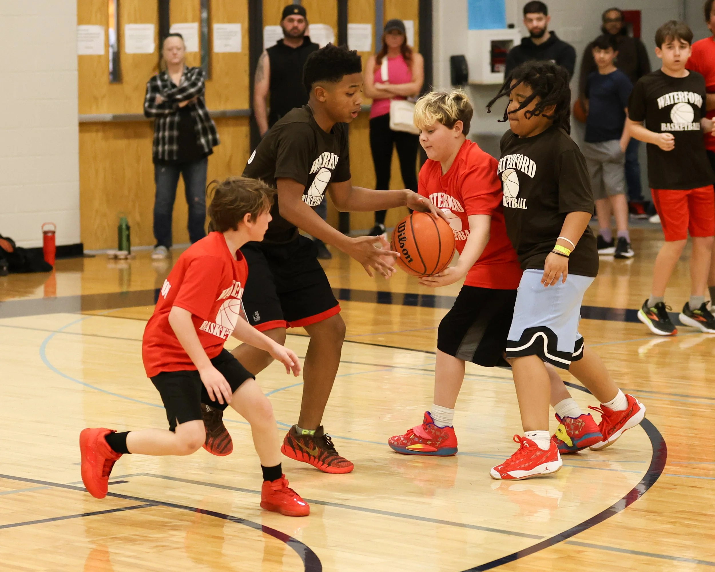 Haviland boy dribbles the ball with Knudsen boy trying to take the ball
