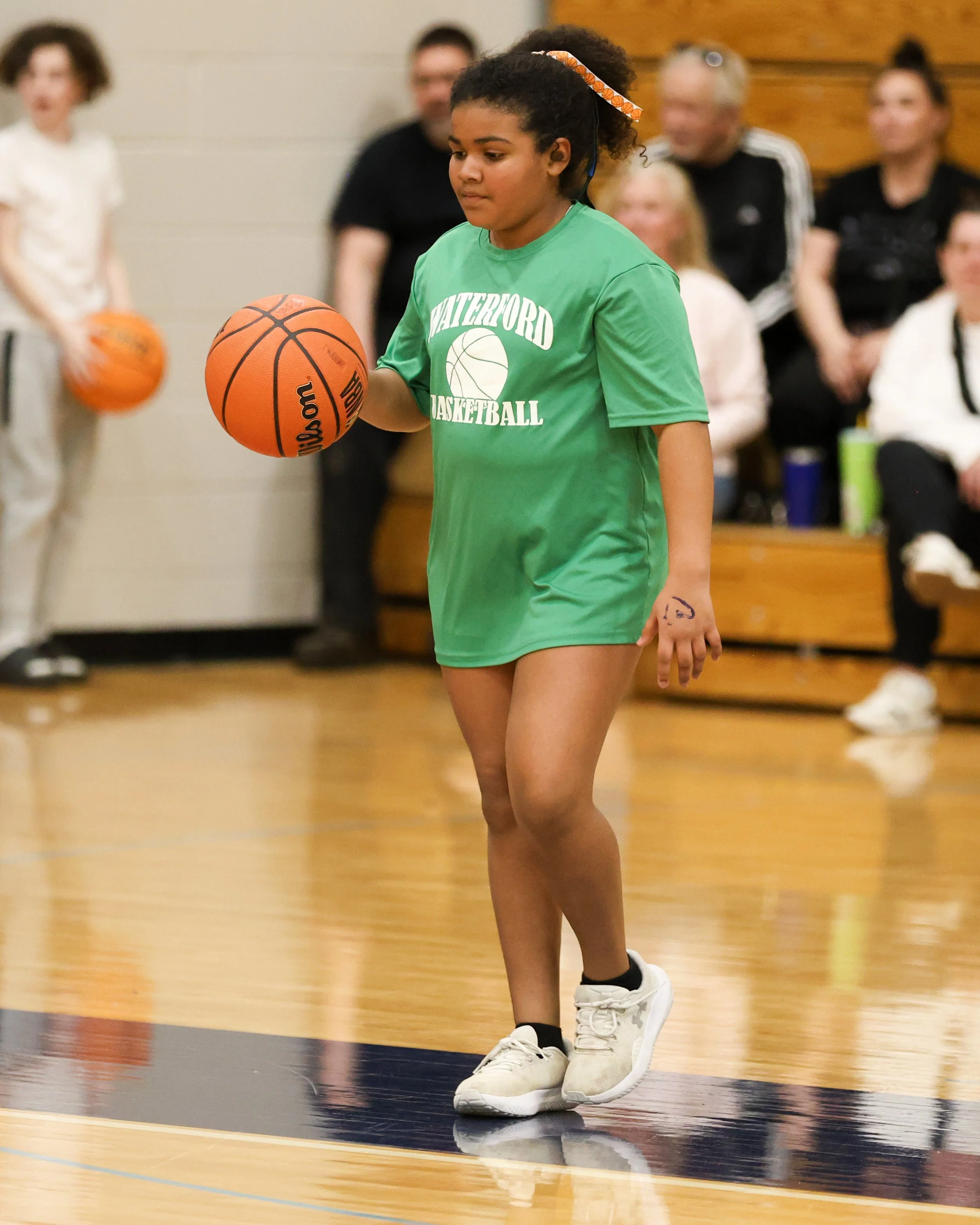 Grayson girl dribbles the ball