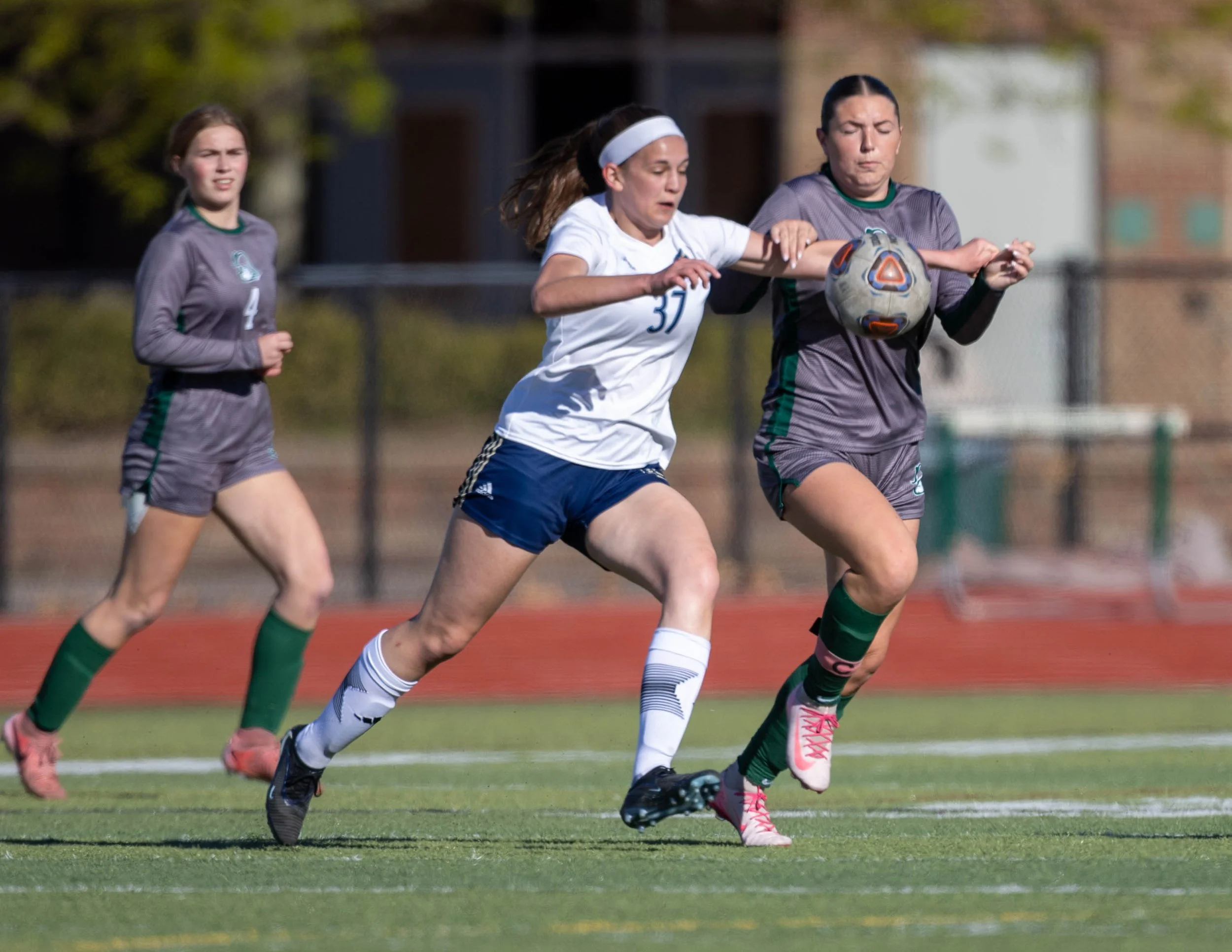 #20 fights for the ball with DCC #37