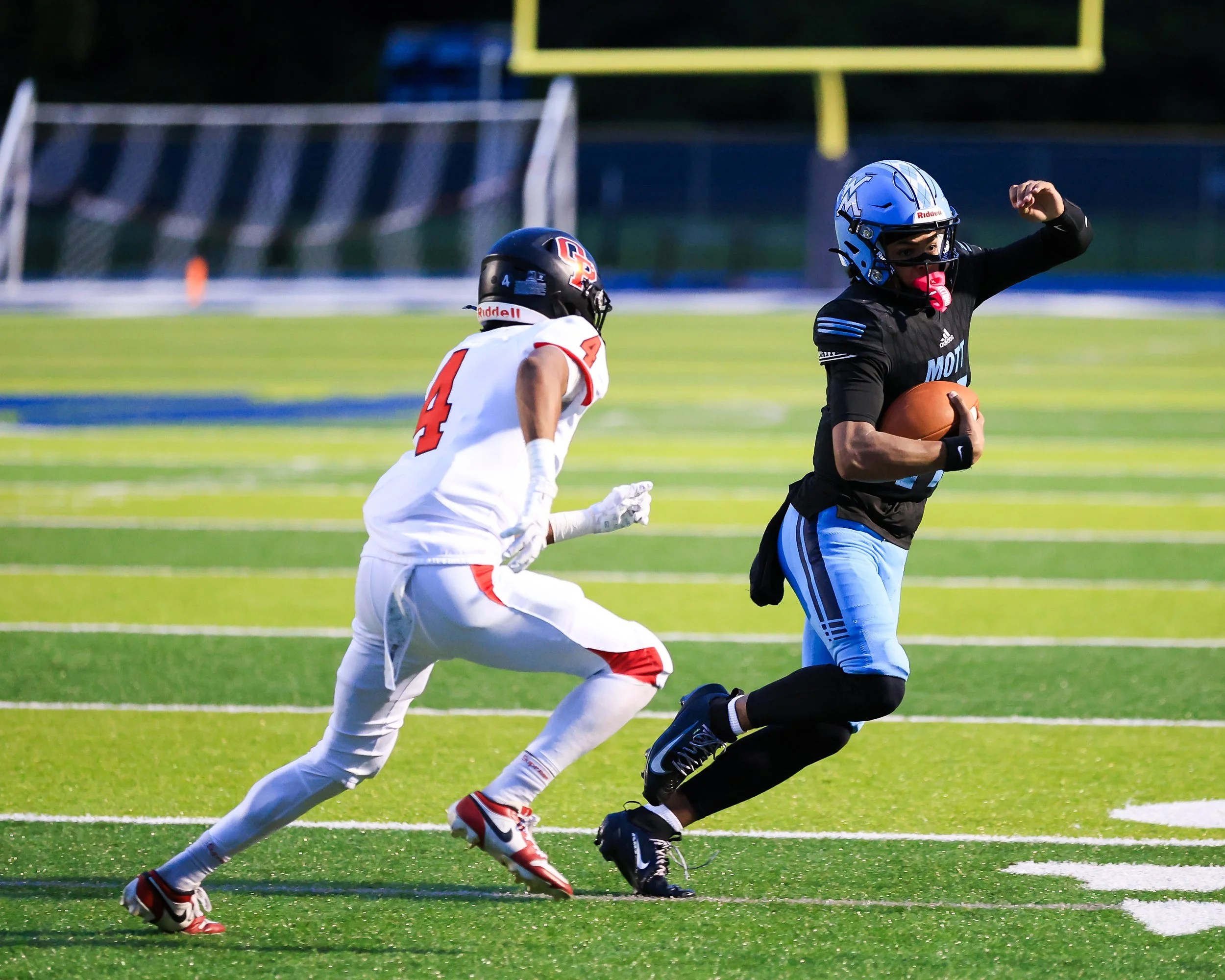 WK #11 eludes the Oak Park player