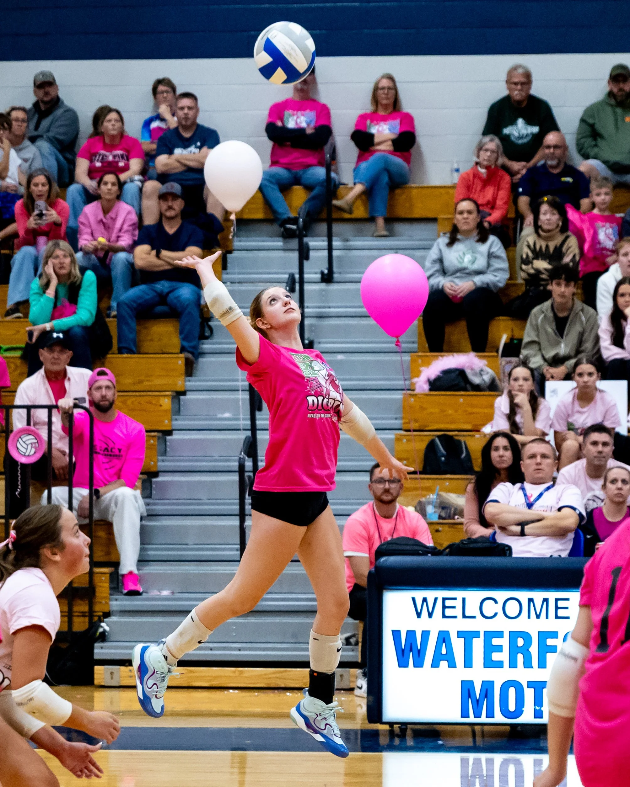 Kettering player hits the ball