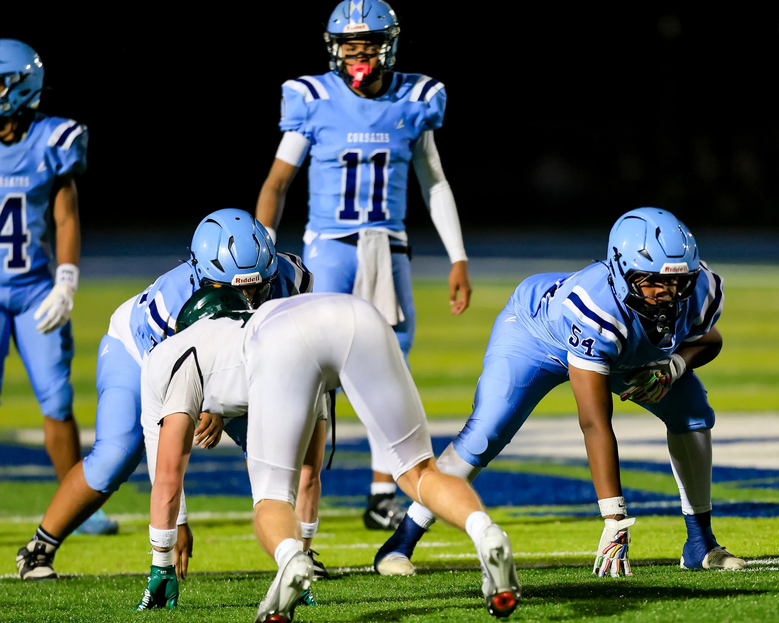 Mott #11 and linemen ready to snap the ball