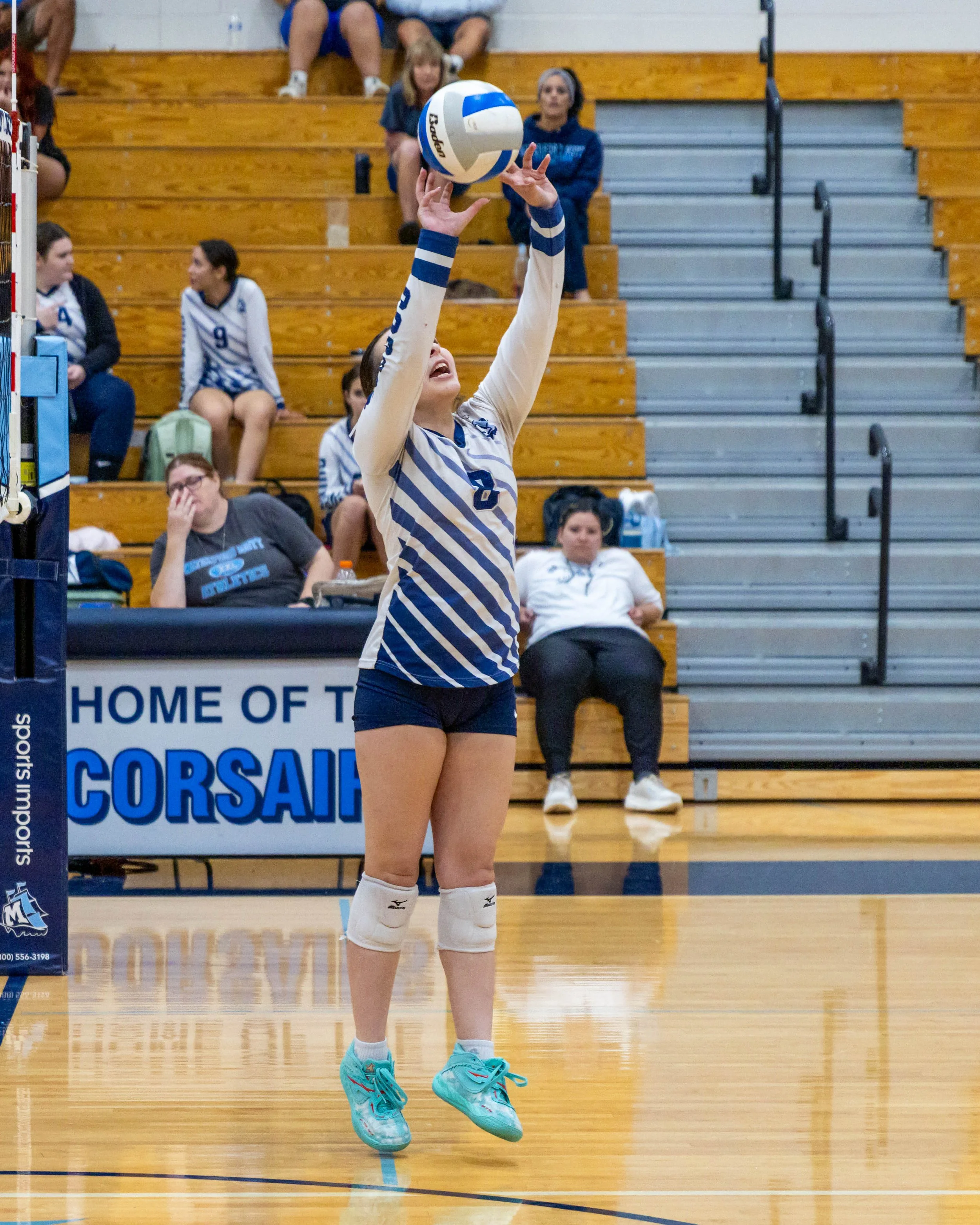 WM #8 serves the ball