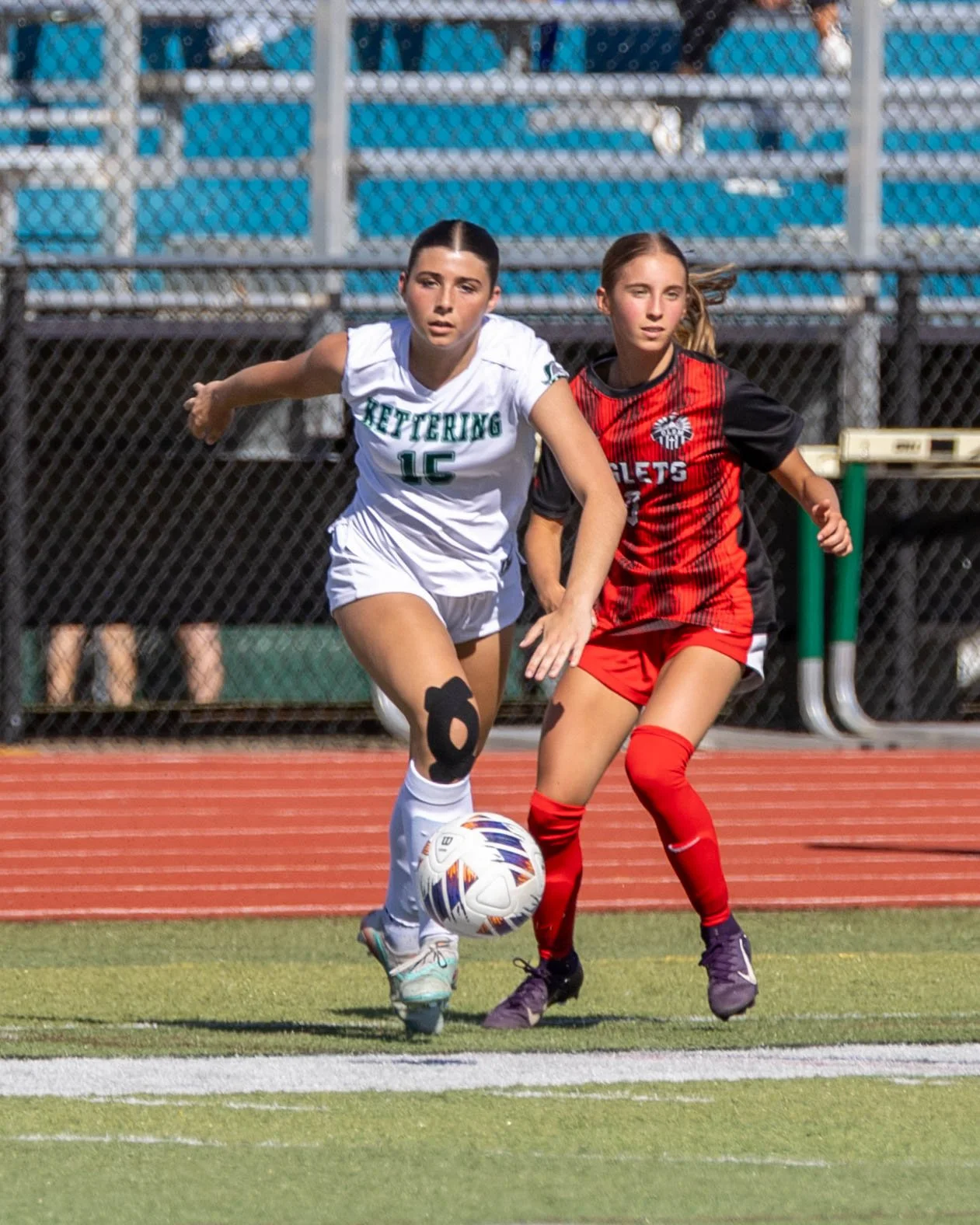#15 gets by an opponent 