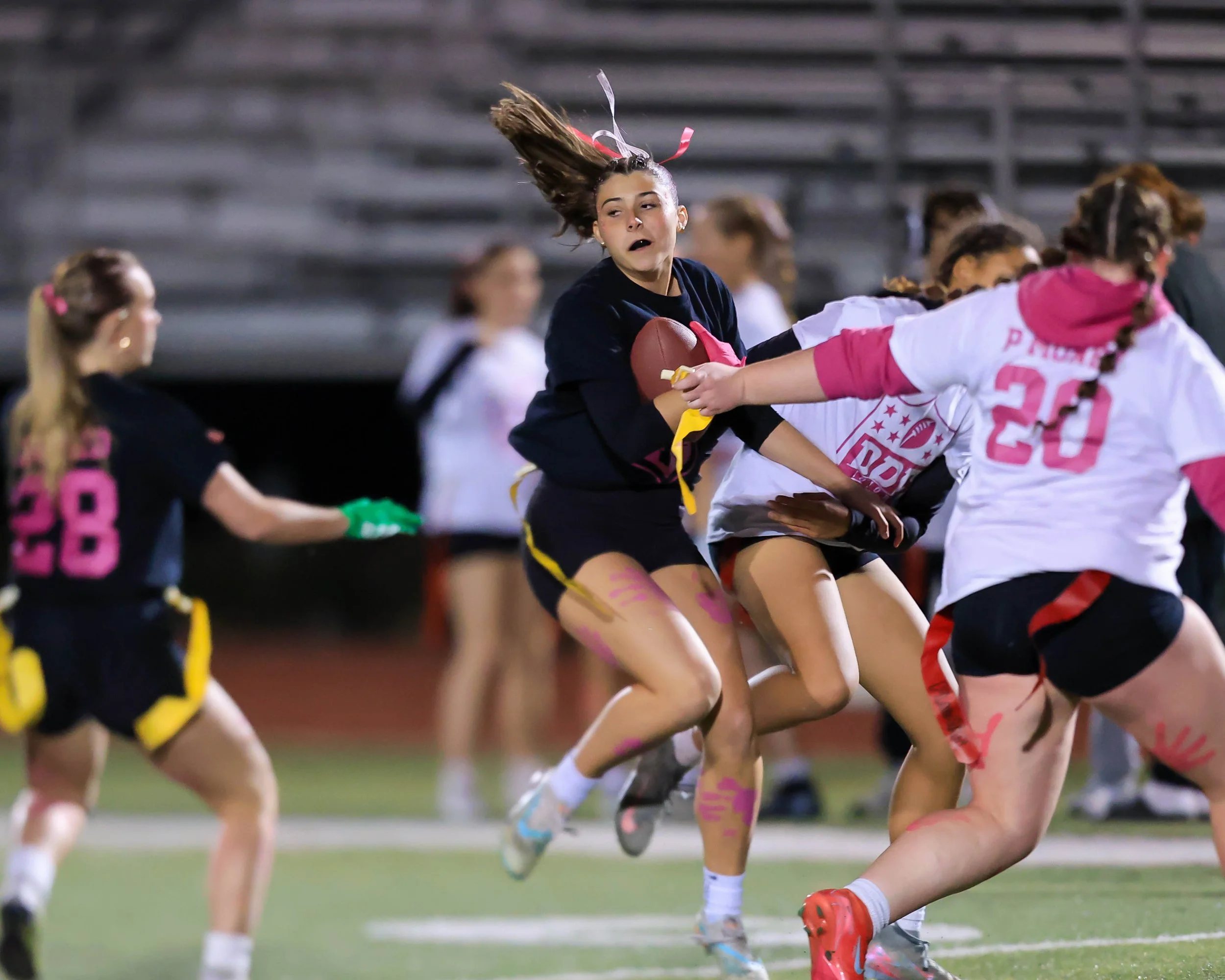 Senior running with the ball
