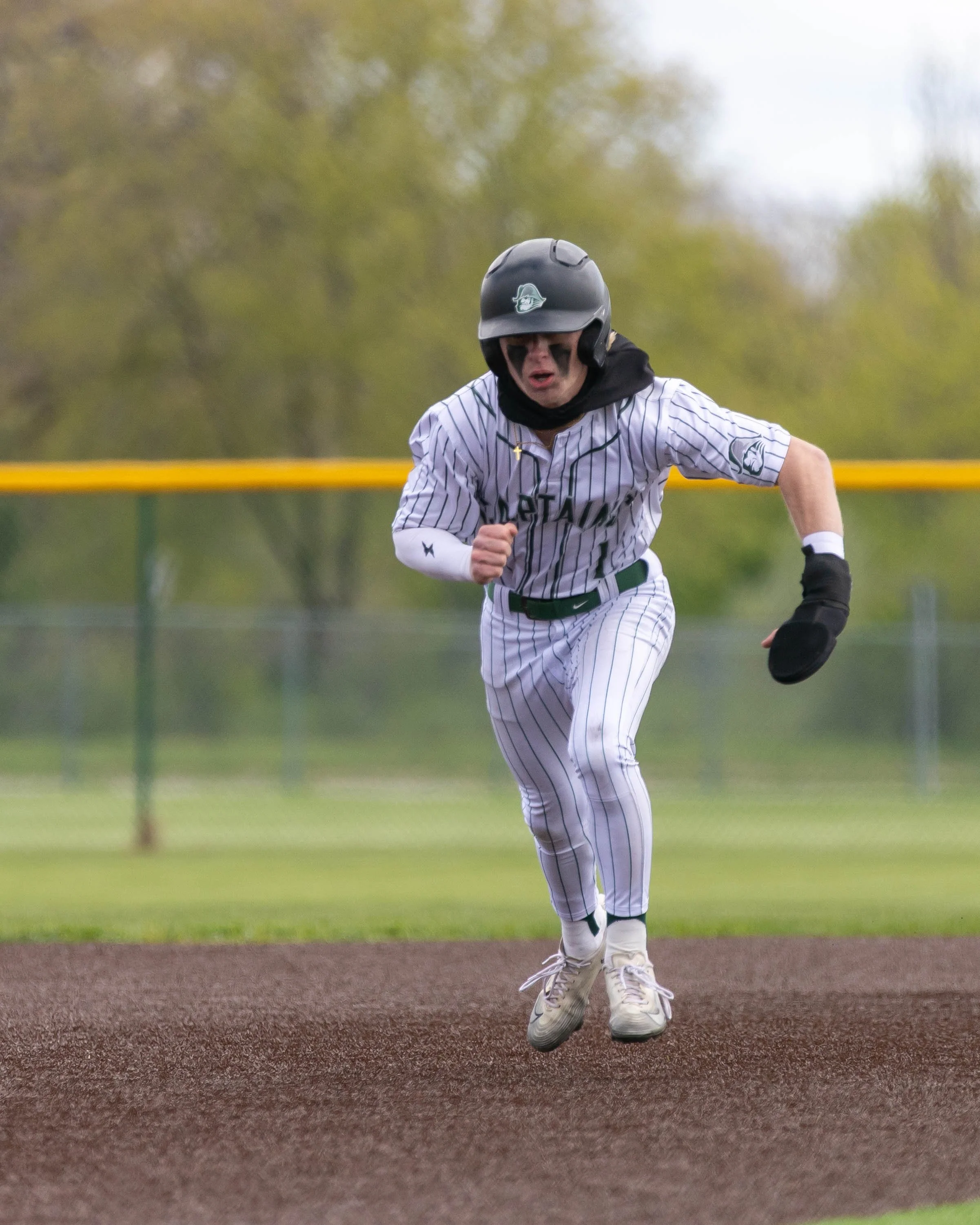 Kettering #1 heading to 3rd base