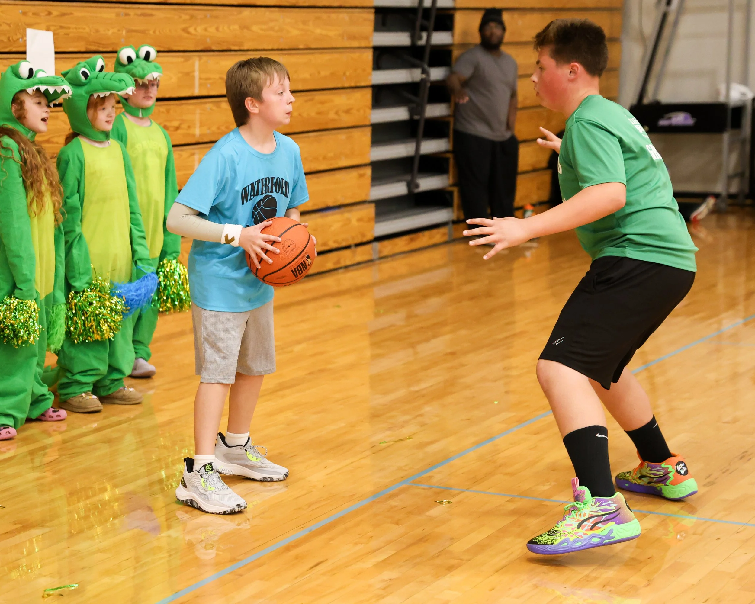 Cooley boy inbounds the ball guarded by Grayson boy