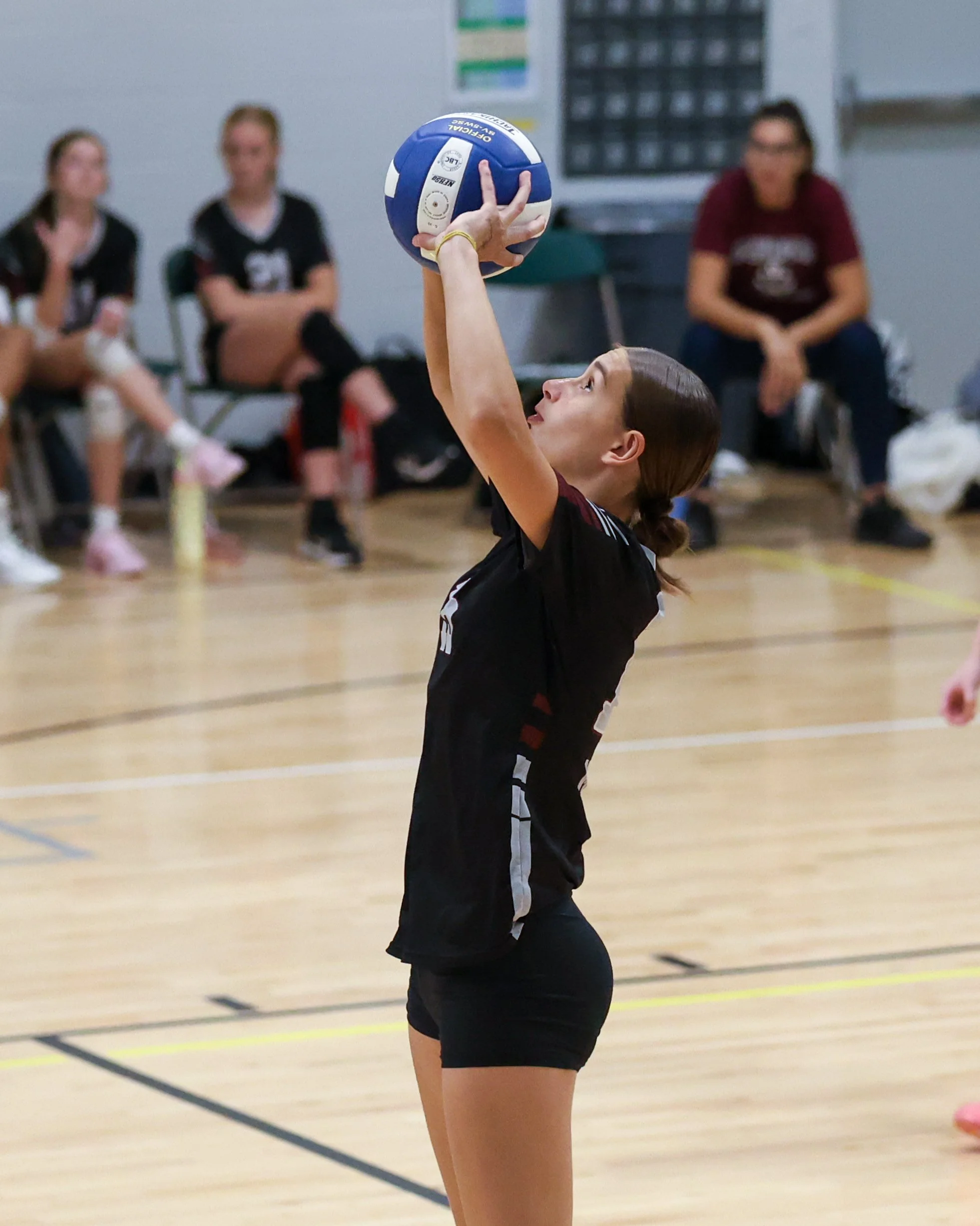 Mason girl returns the ball
