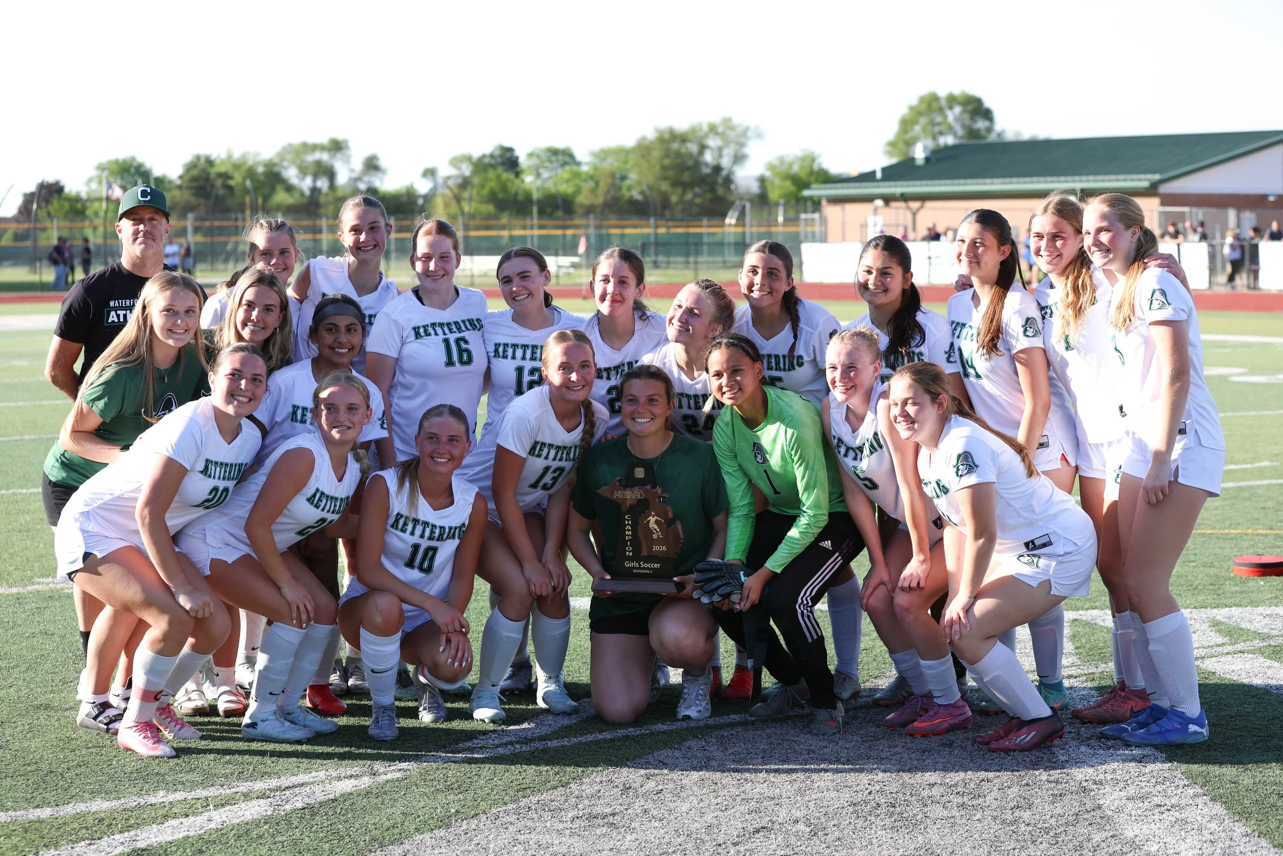 Kettering team picture with the trophy