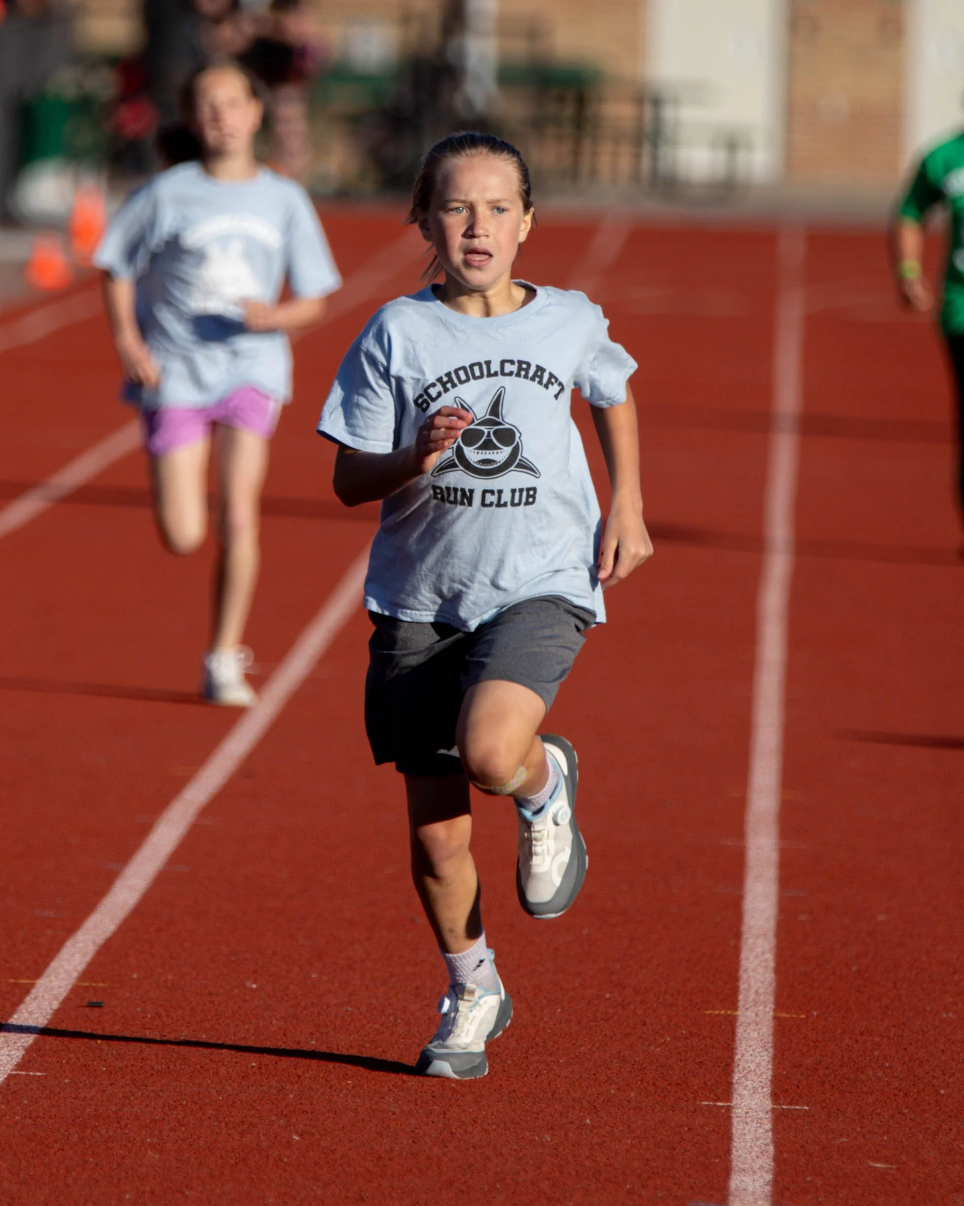 Schoolcraft runner at the finish line
