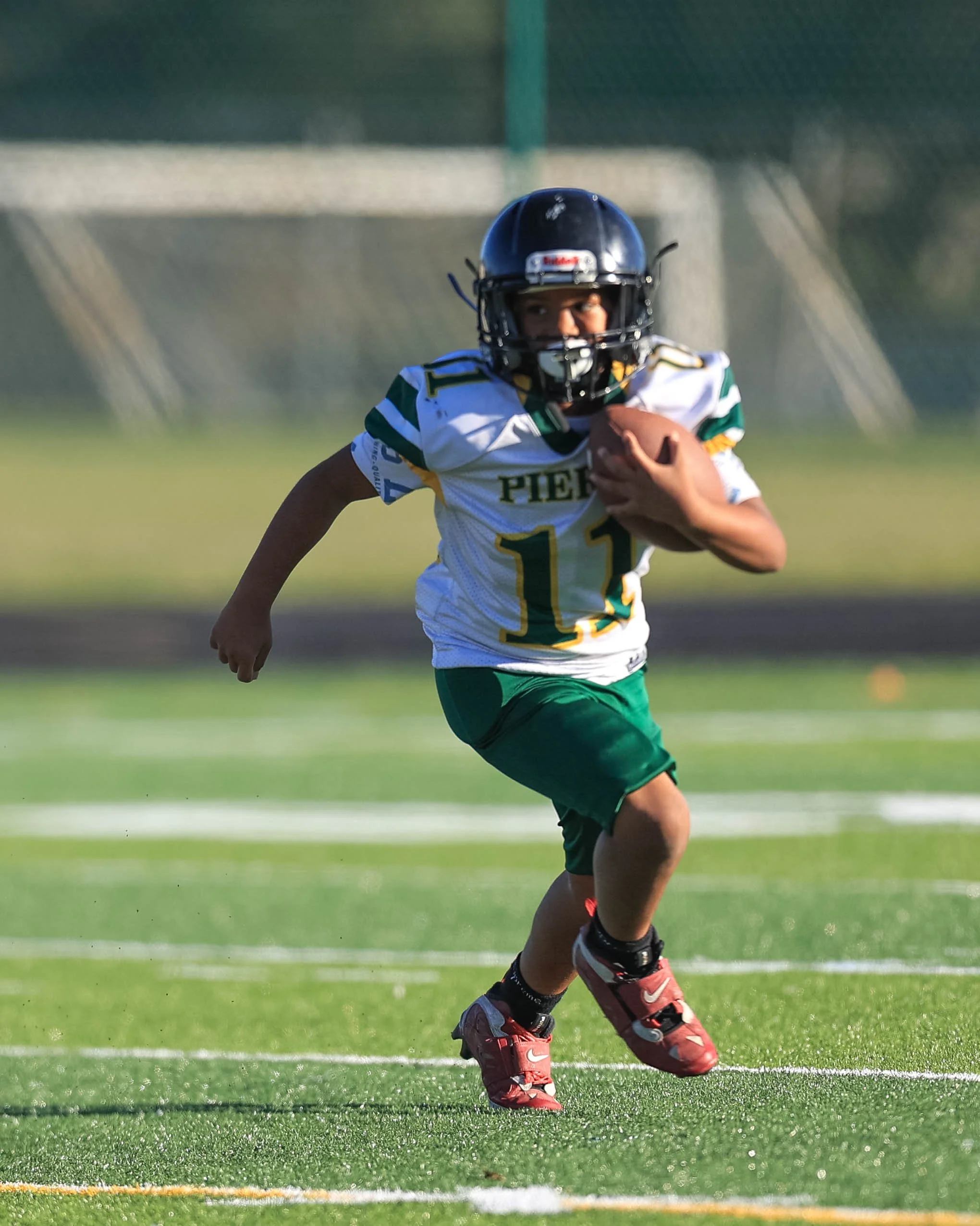 Pierce #11 with the ball
