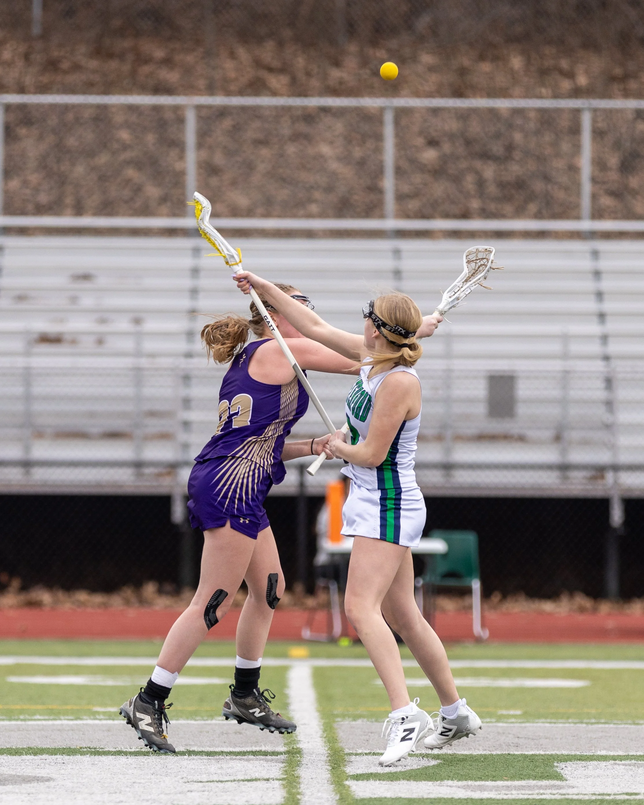 #9 battles for the ball