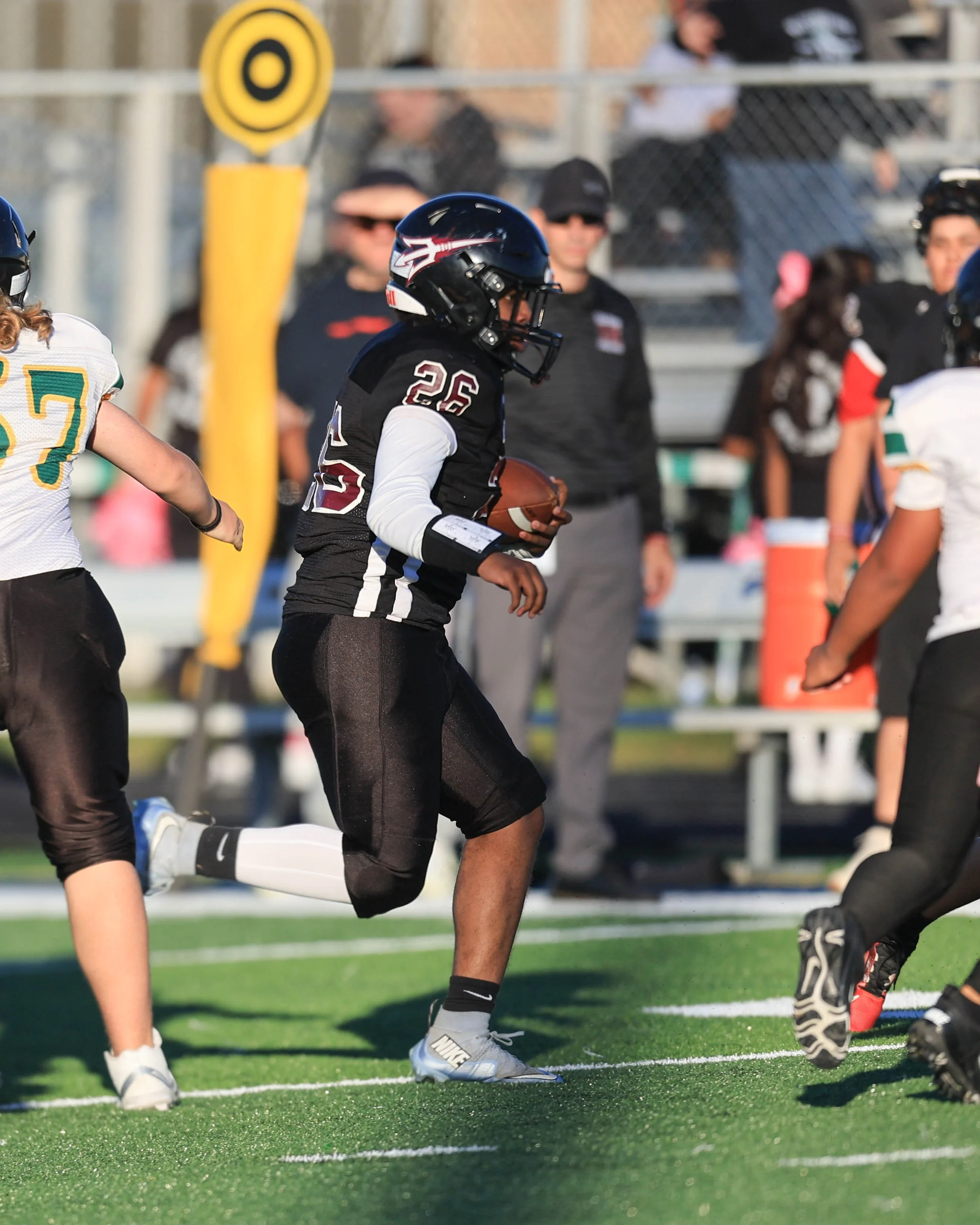 Mason #26 returns the kick