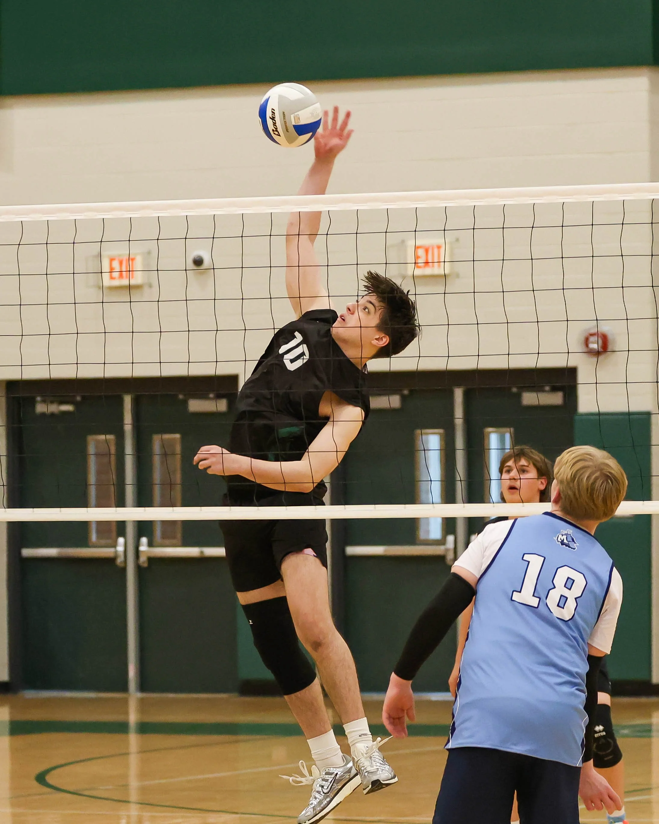 Kettering #10 spikes the ball