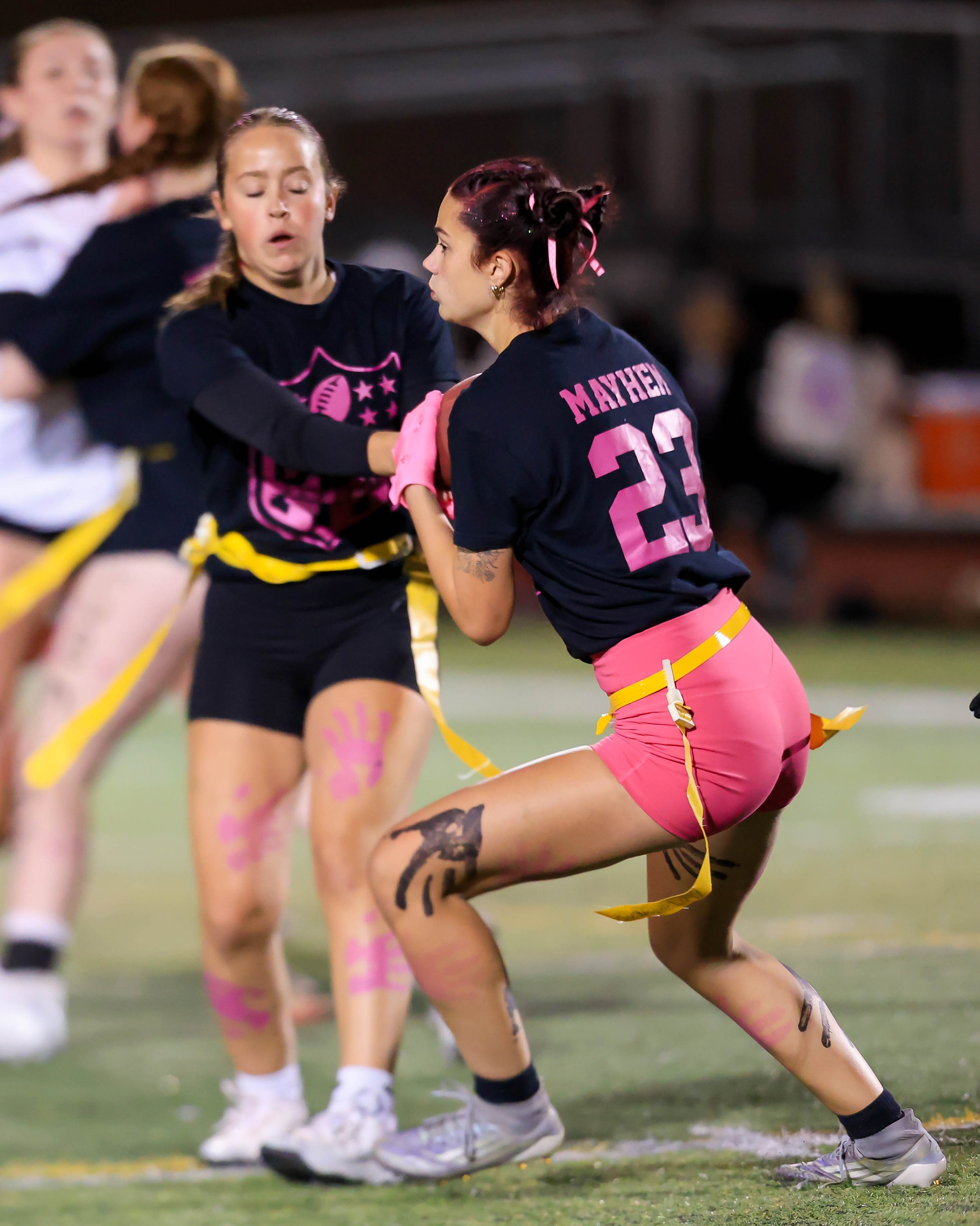 Senior quarterback hands off the ball