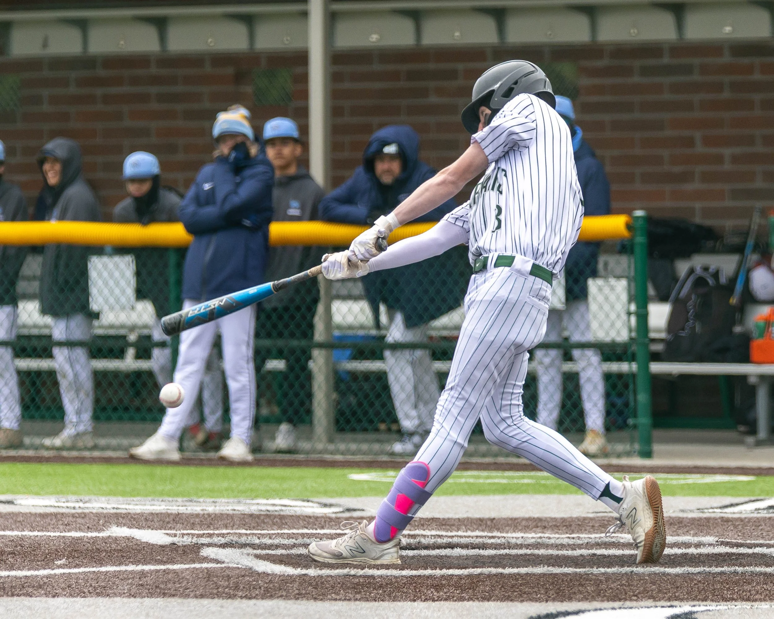Kettering #3 hits the ball