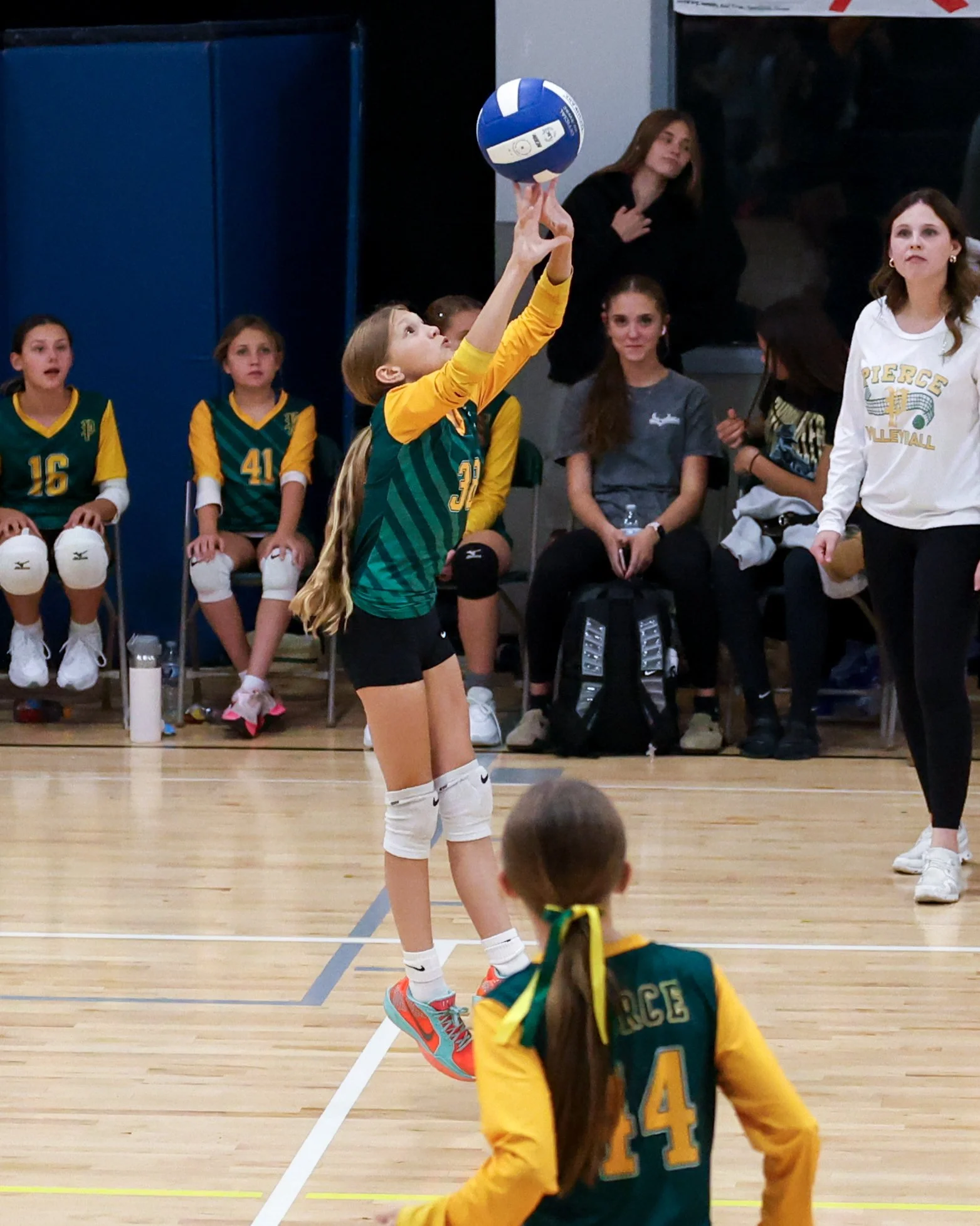 Pierce girl returns the ball