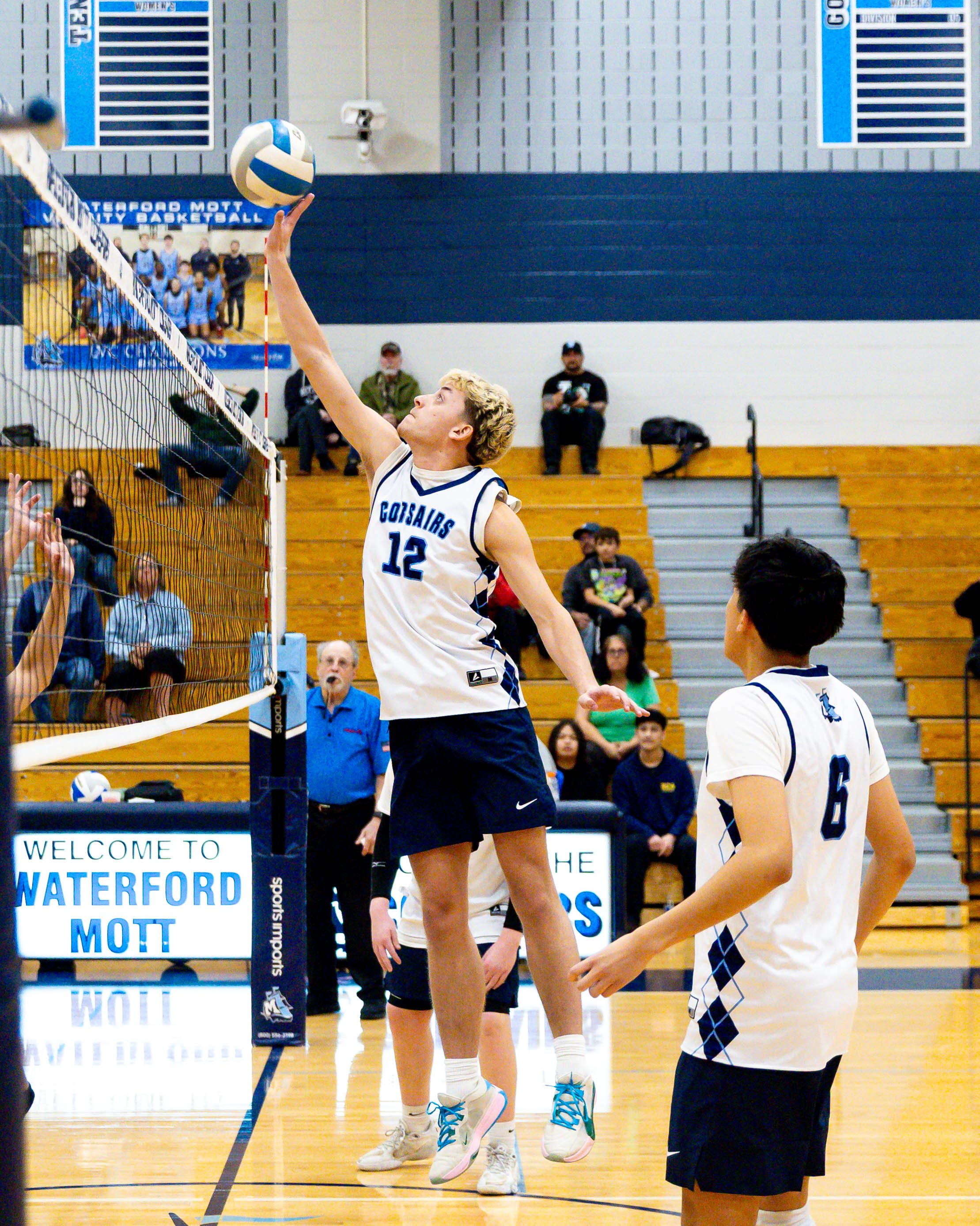 Mott #12 tips the ball