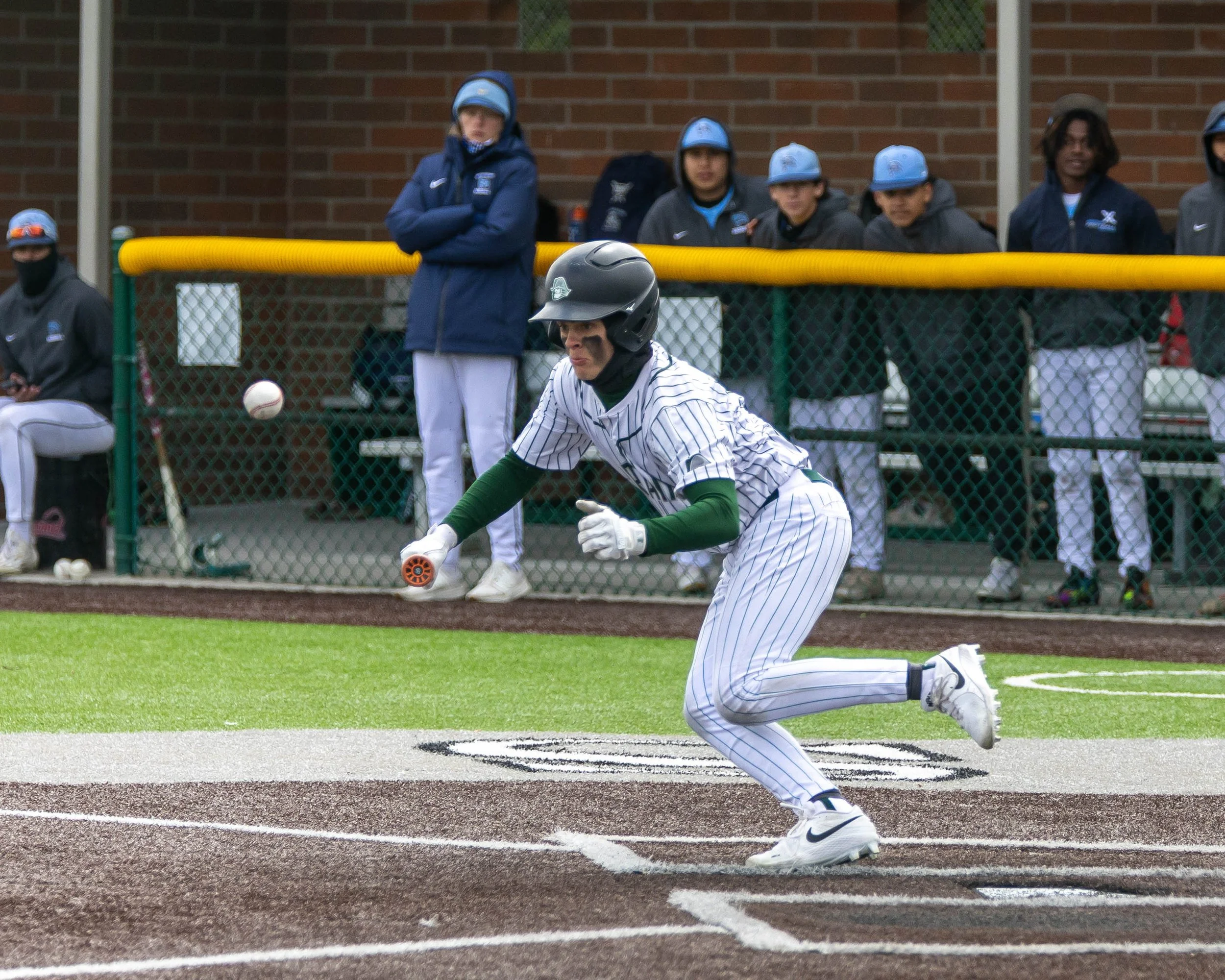 Kettering #6 watches the bunt