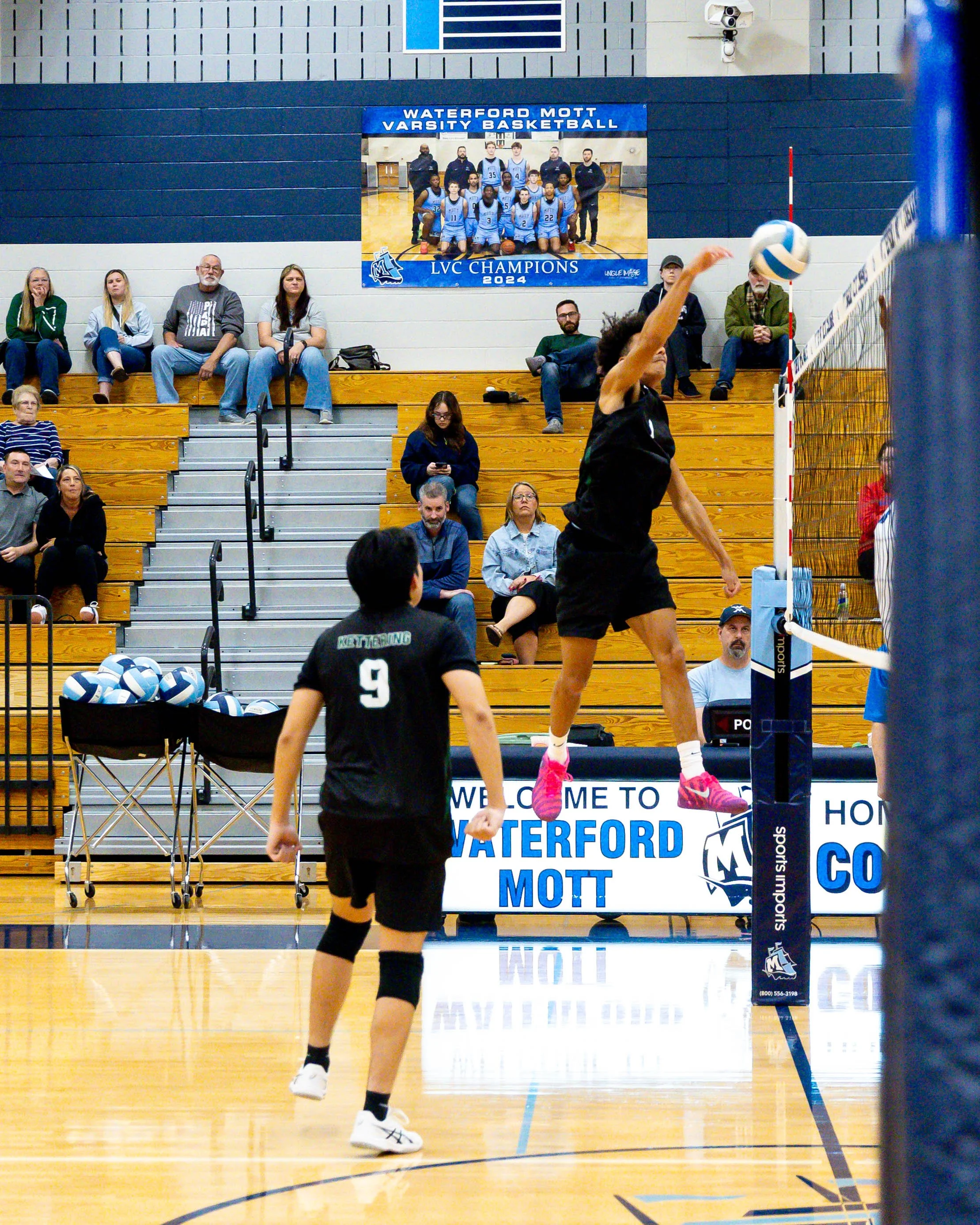 Kettering #1 spikes the ball