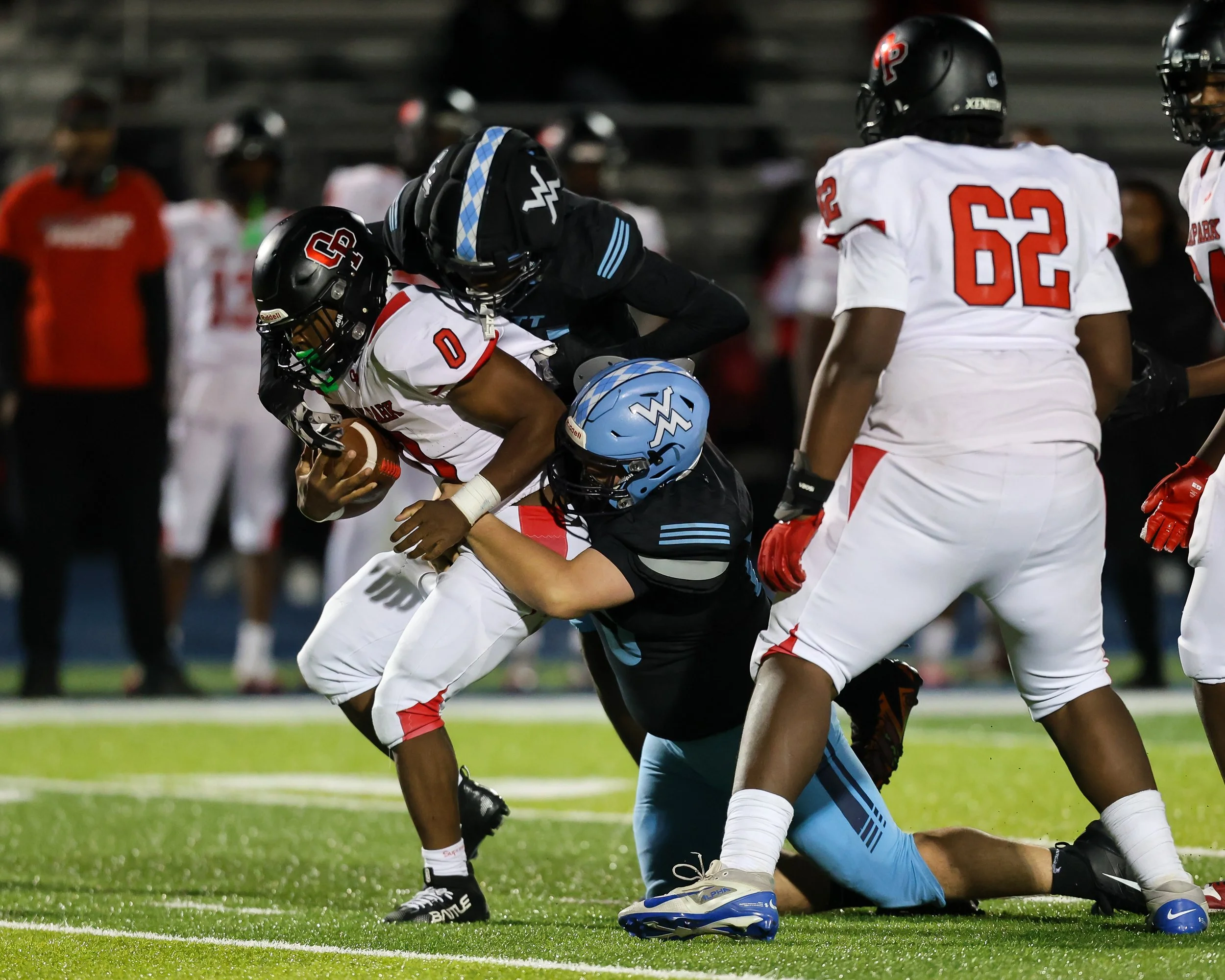 WM defense tackles the running back