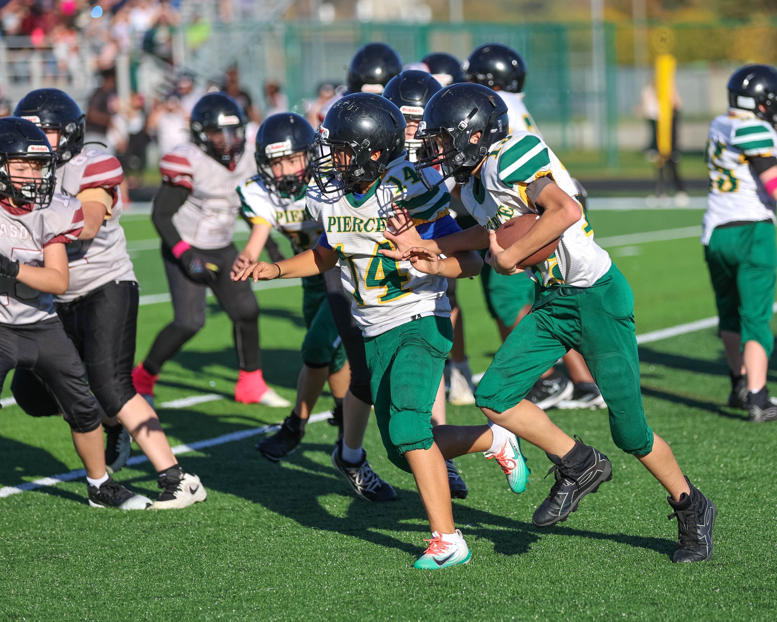 Pierce #18 carries the ball
