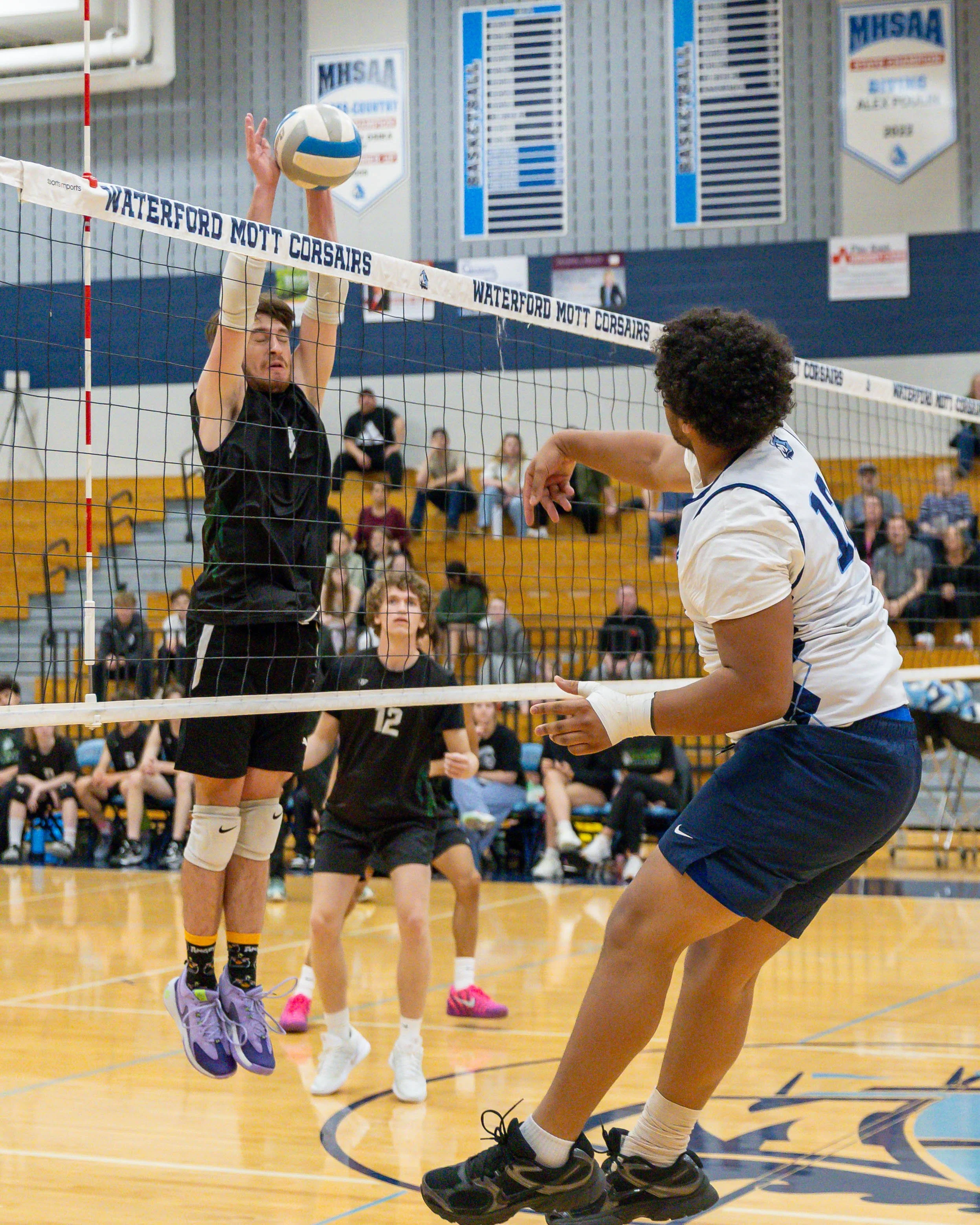 Kettering #3 blocks the ball