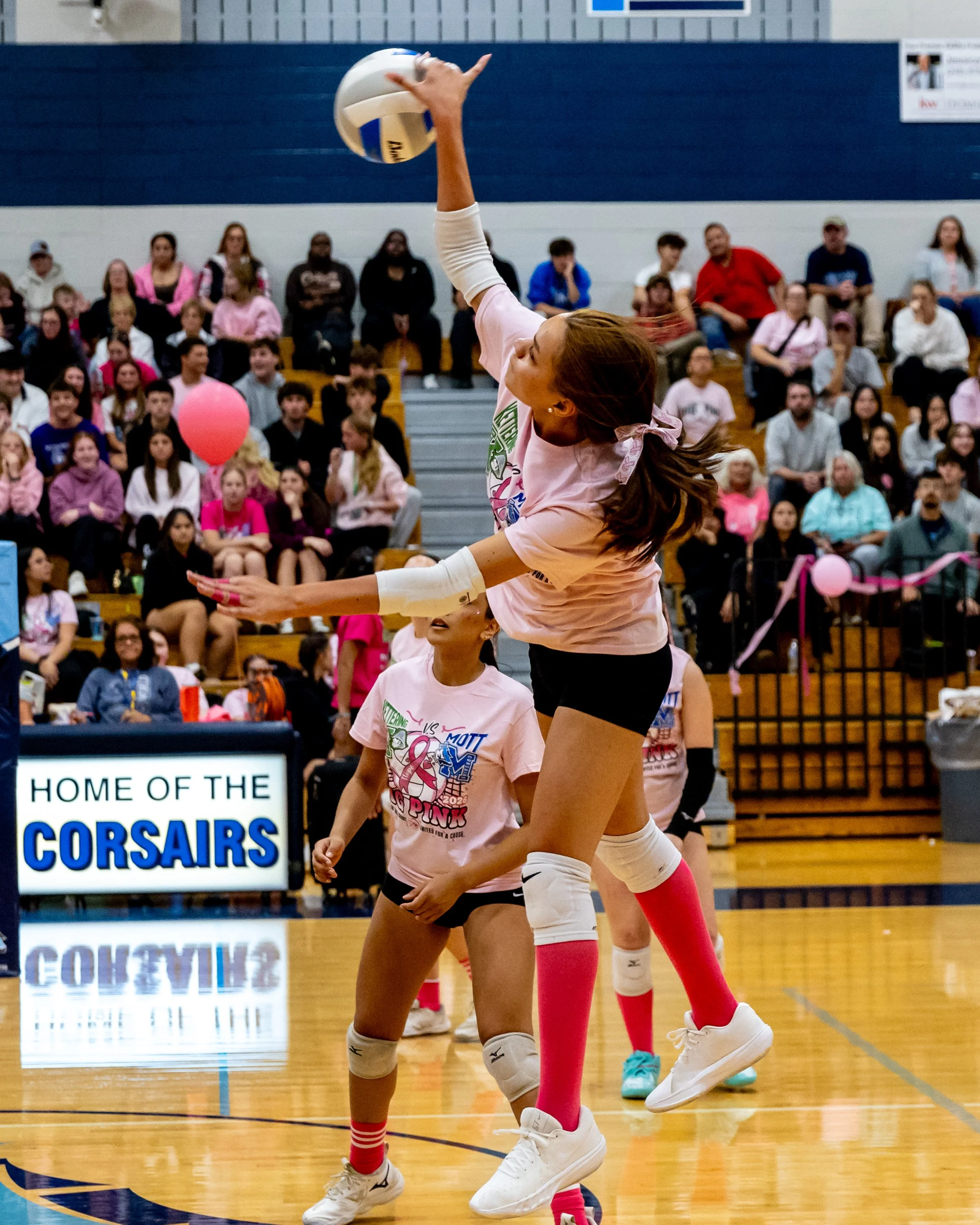 Mott player hits the ball