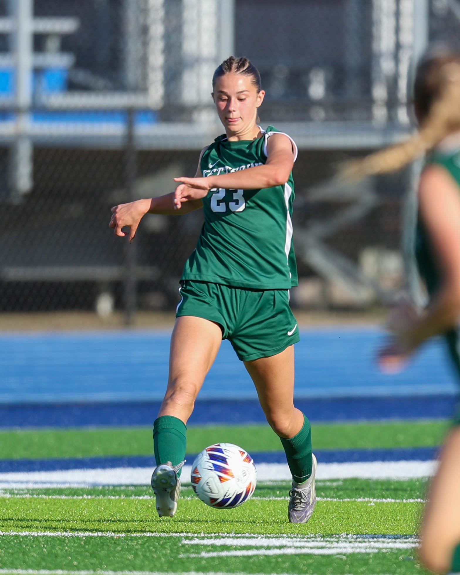 #23 kicks the ball