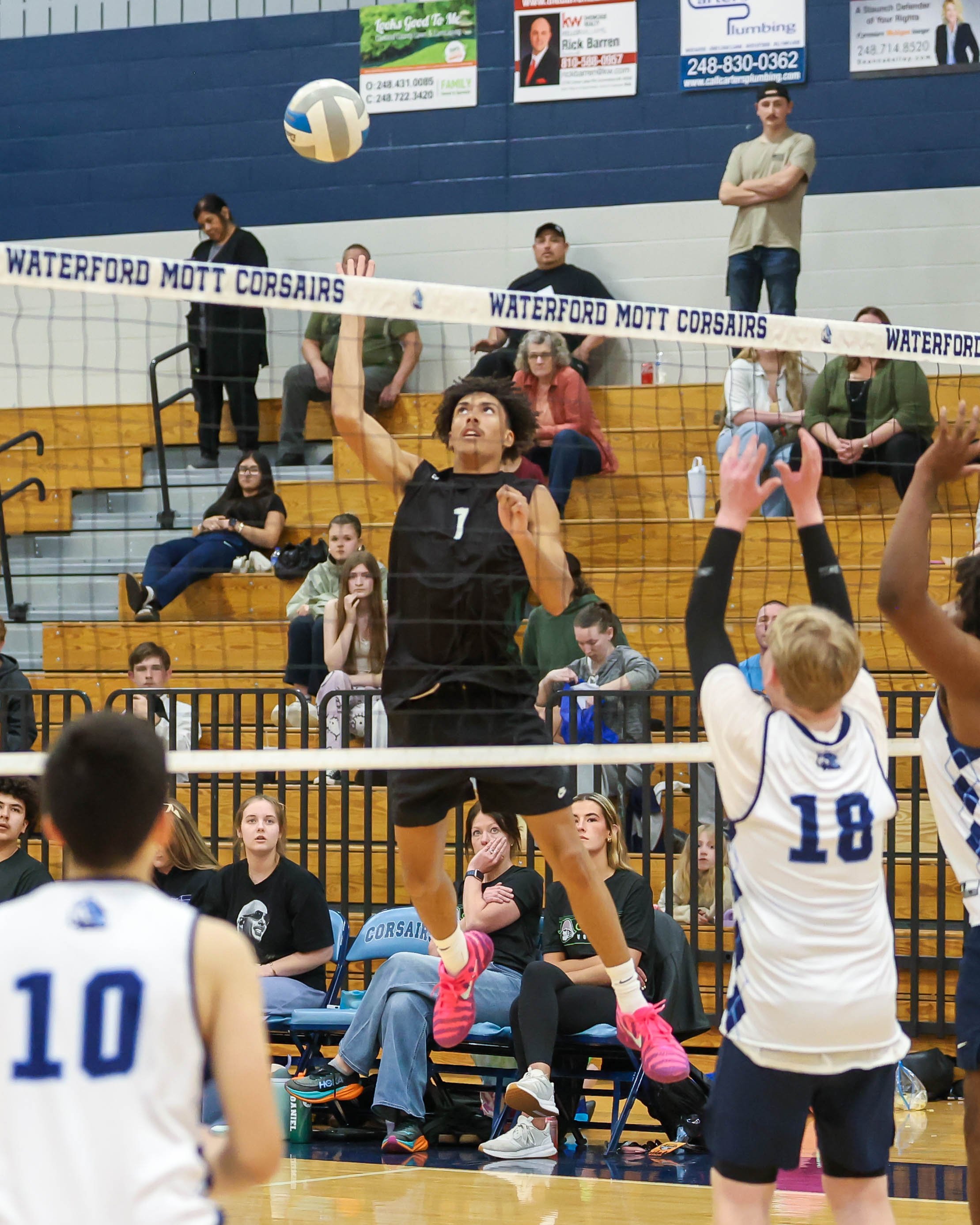 Kettering #1 spikes the ball