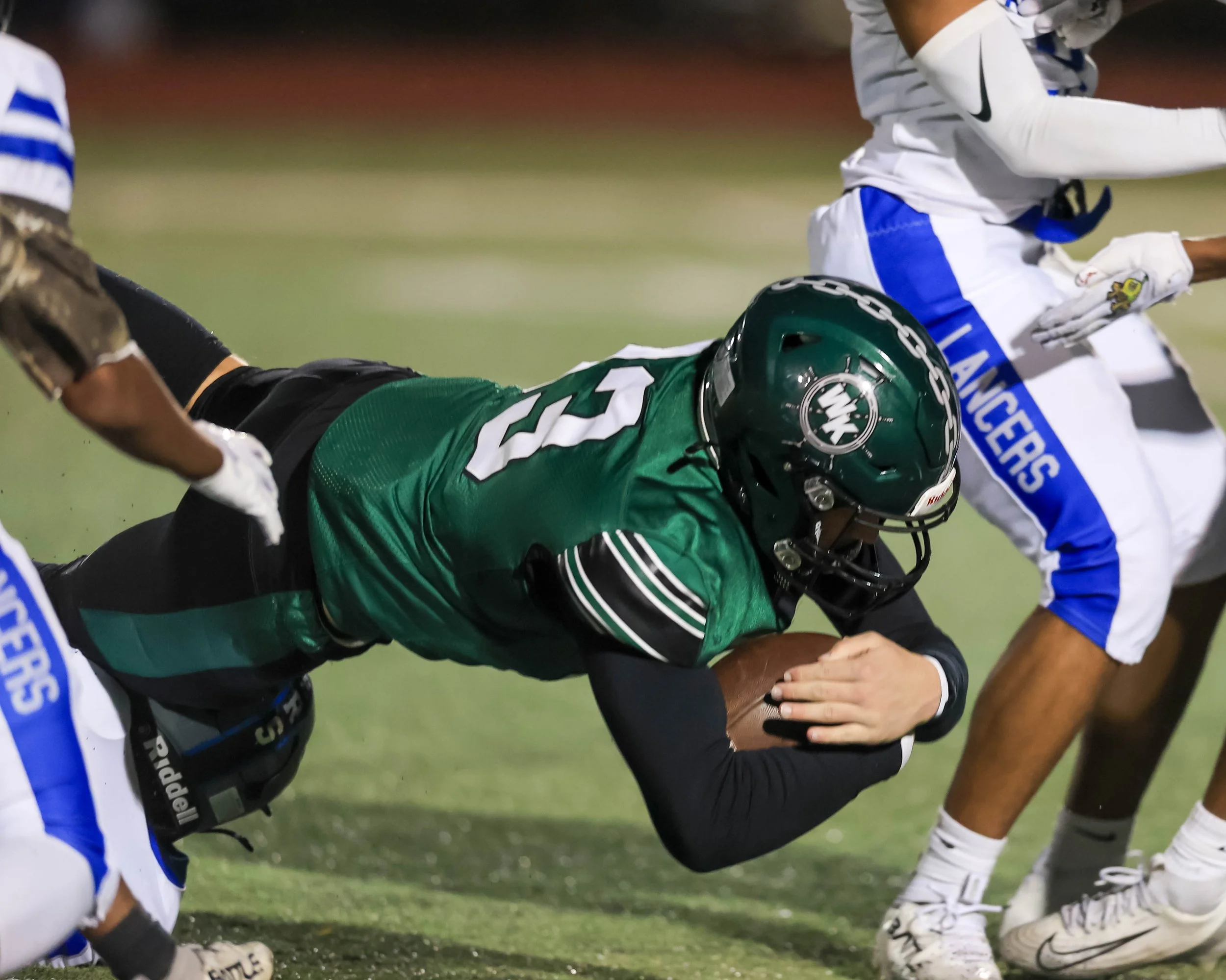 WK #13 dives for the firstdown