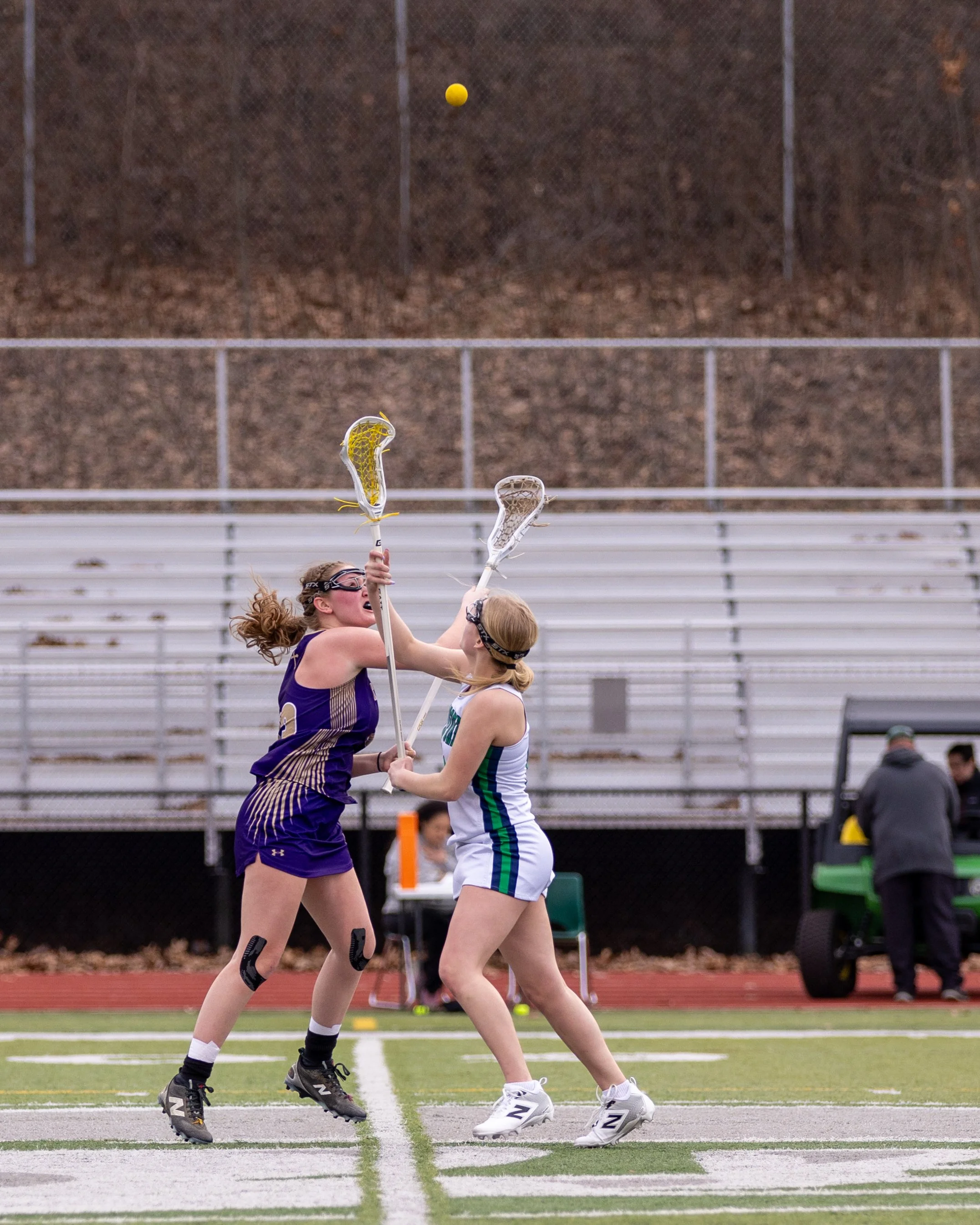 #9 faces off with the ball in air