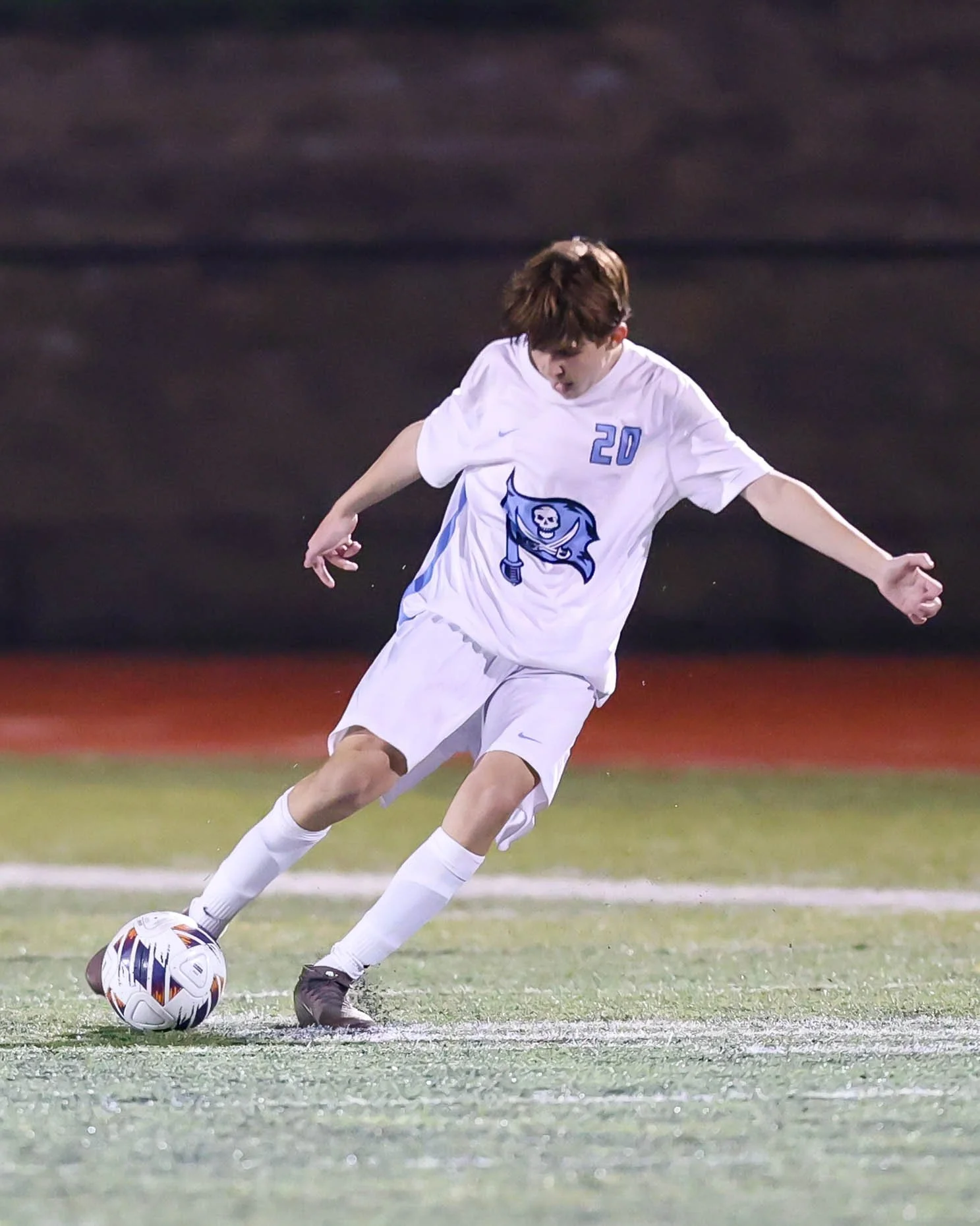 WM #20 kicks the ball