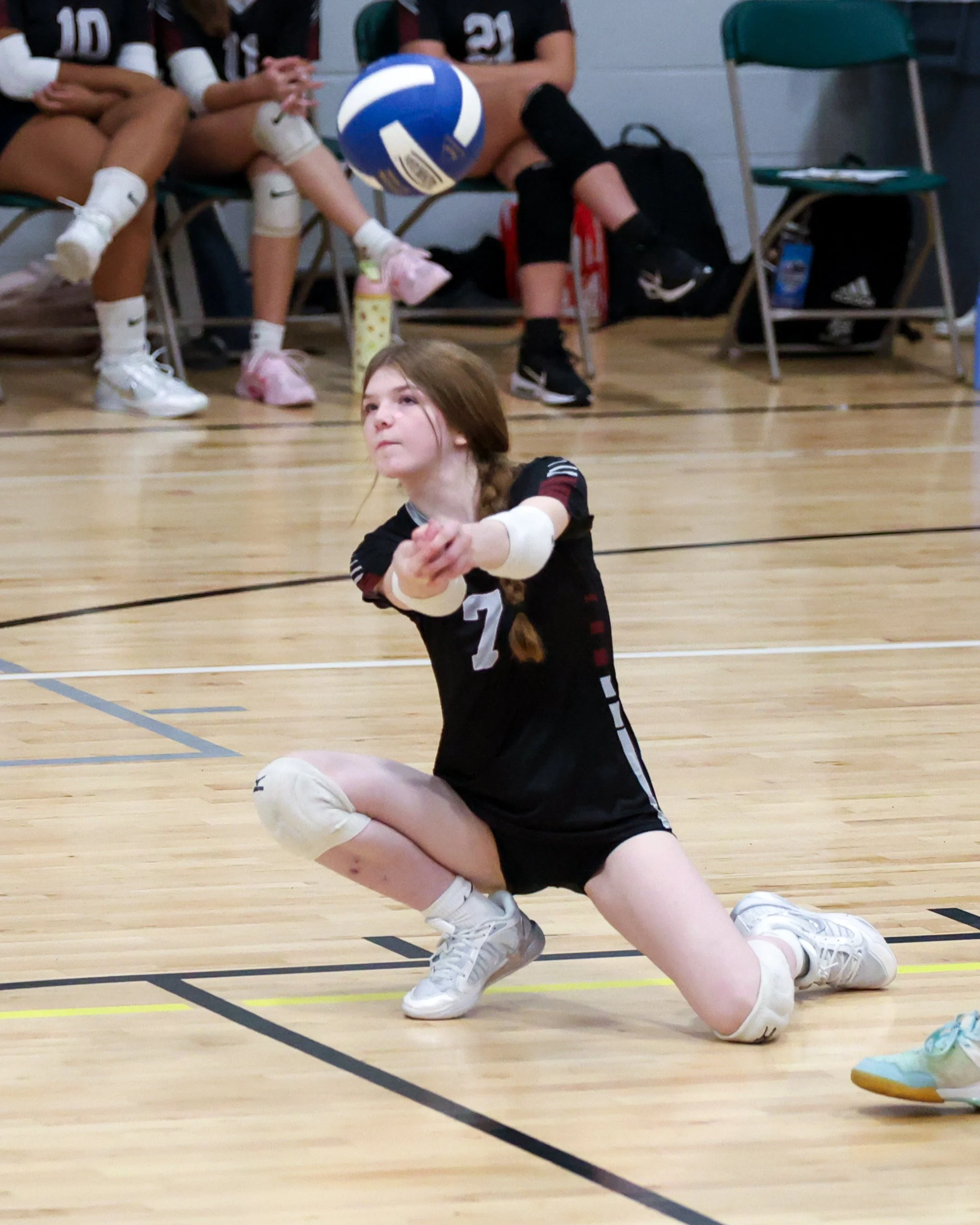 Mason girl returns the ball