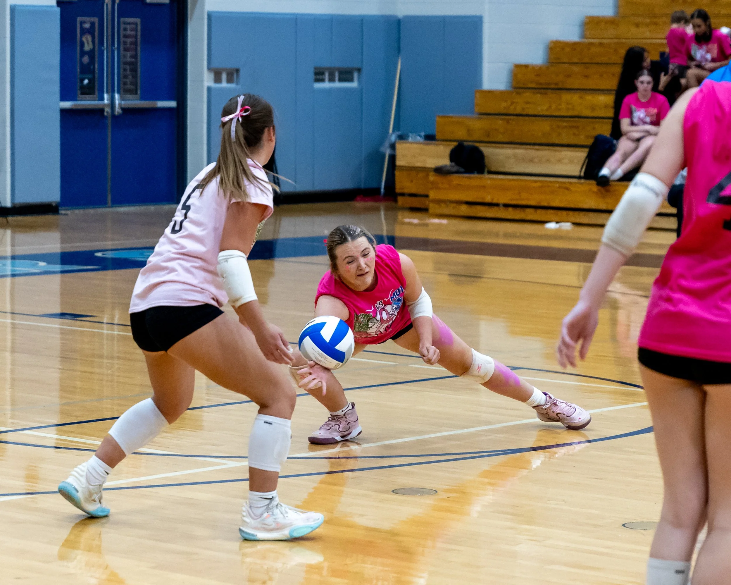 Kettering player hits the ball