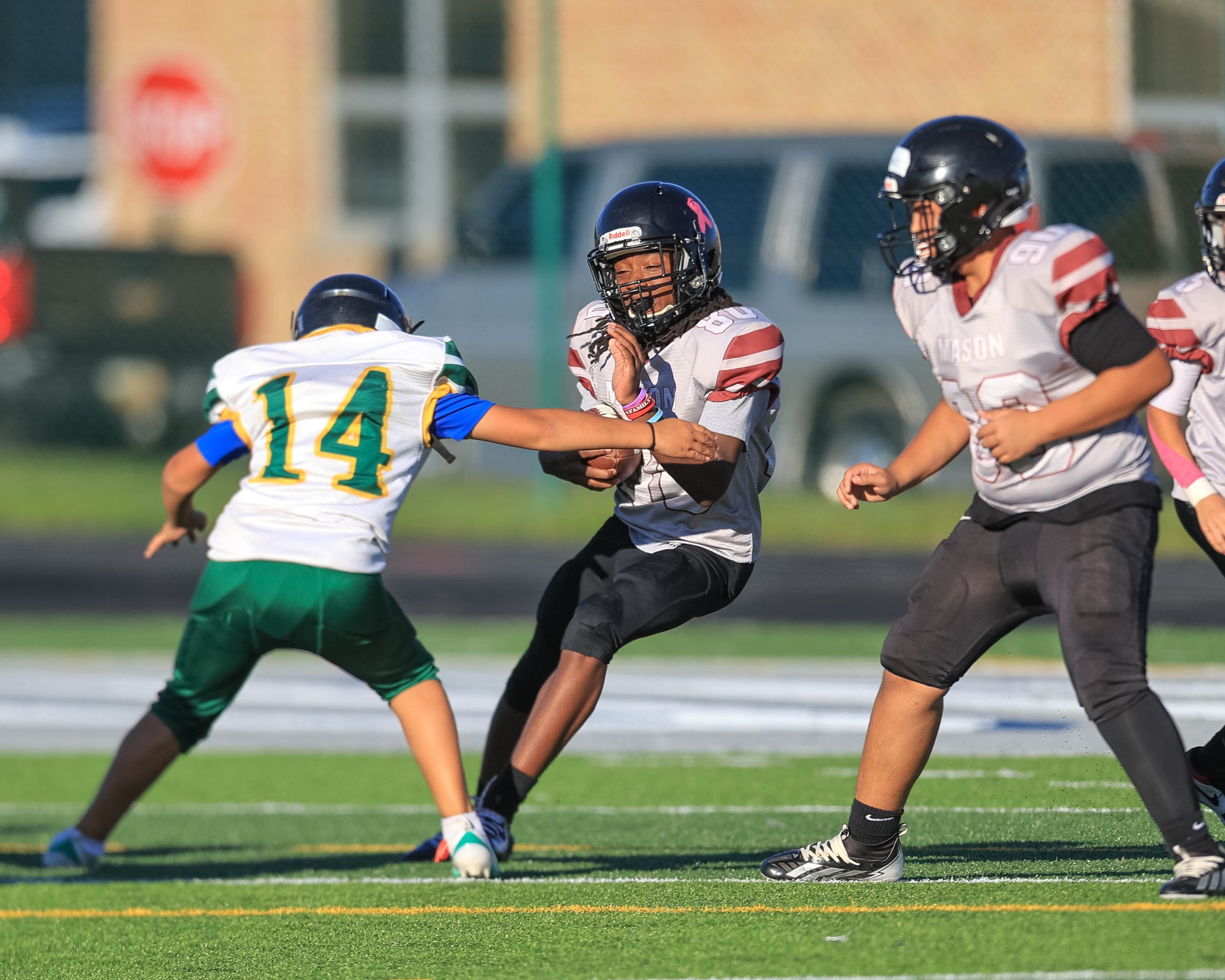 Mason #80 carries the ball