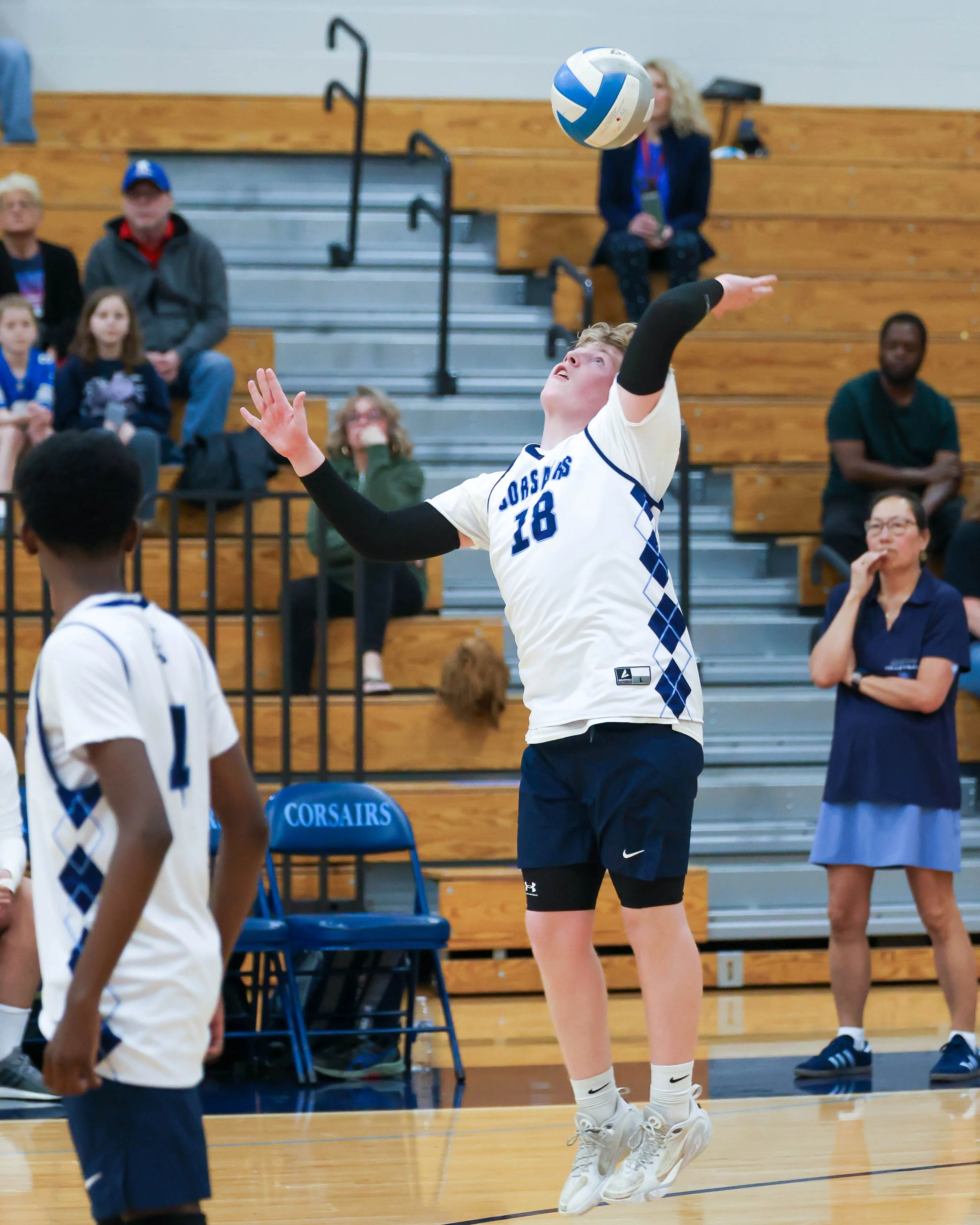 Mott #1 serves the ball