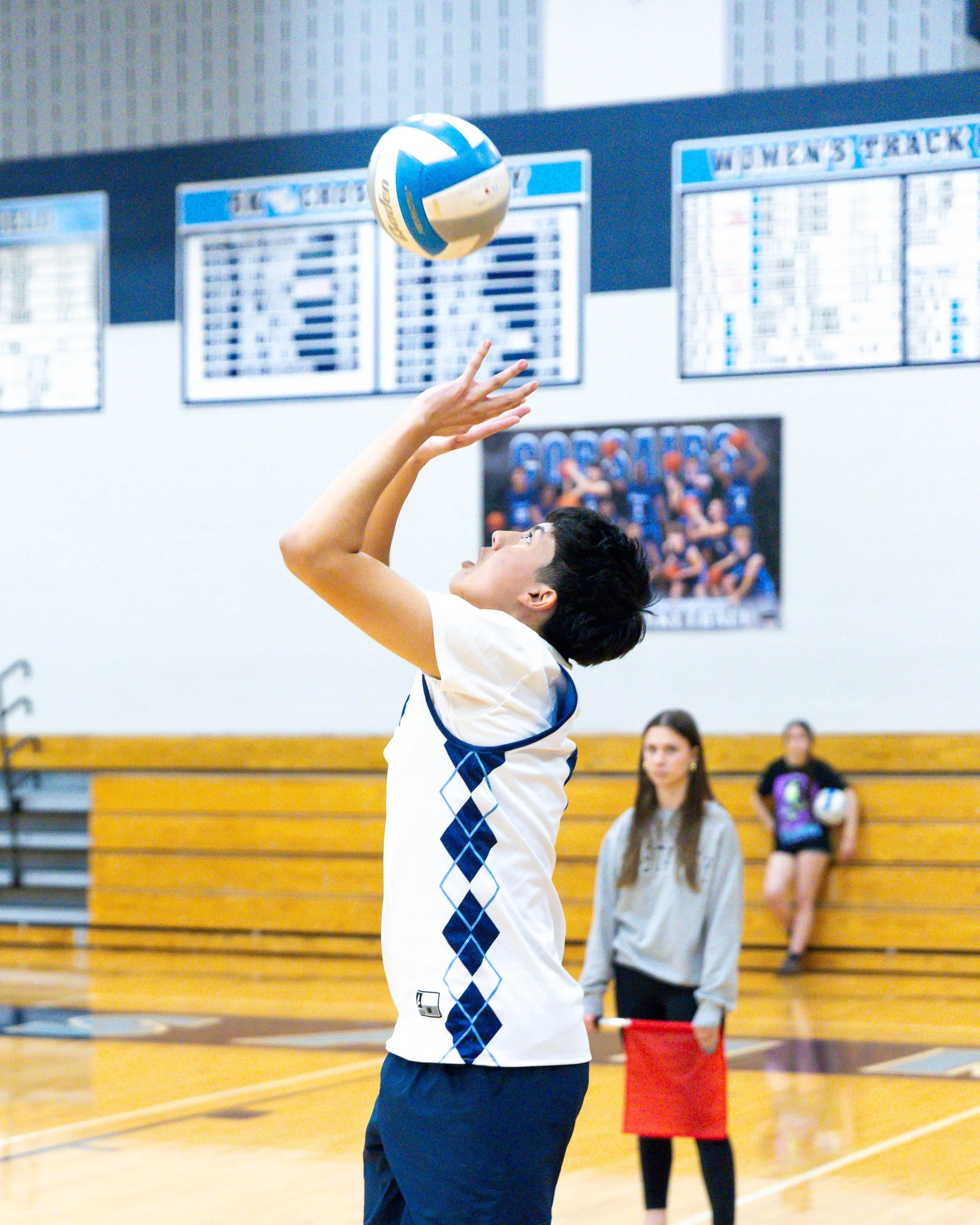 Mott #6 sets the ball