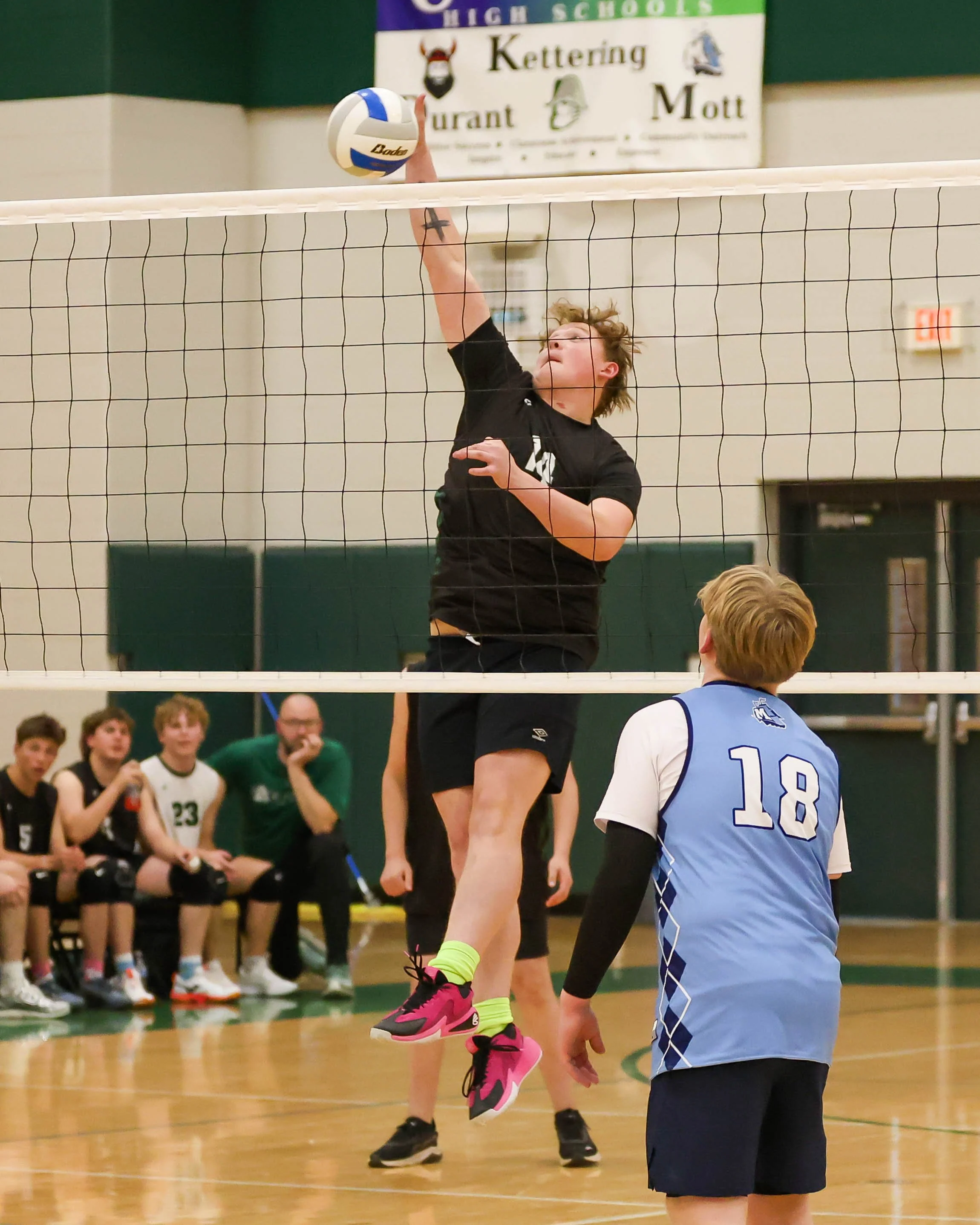 Kettering #14 spikes the ball