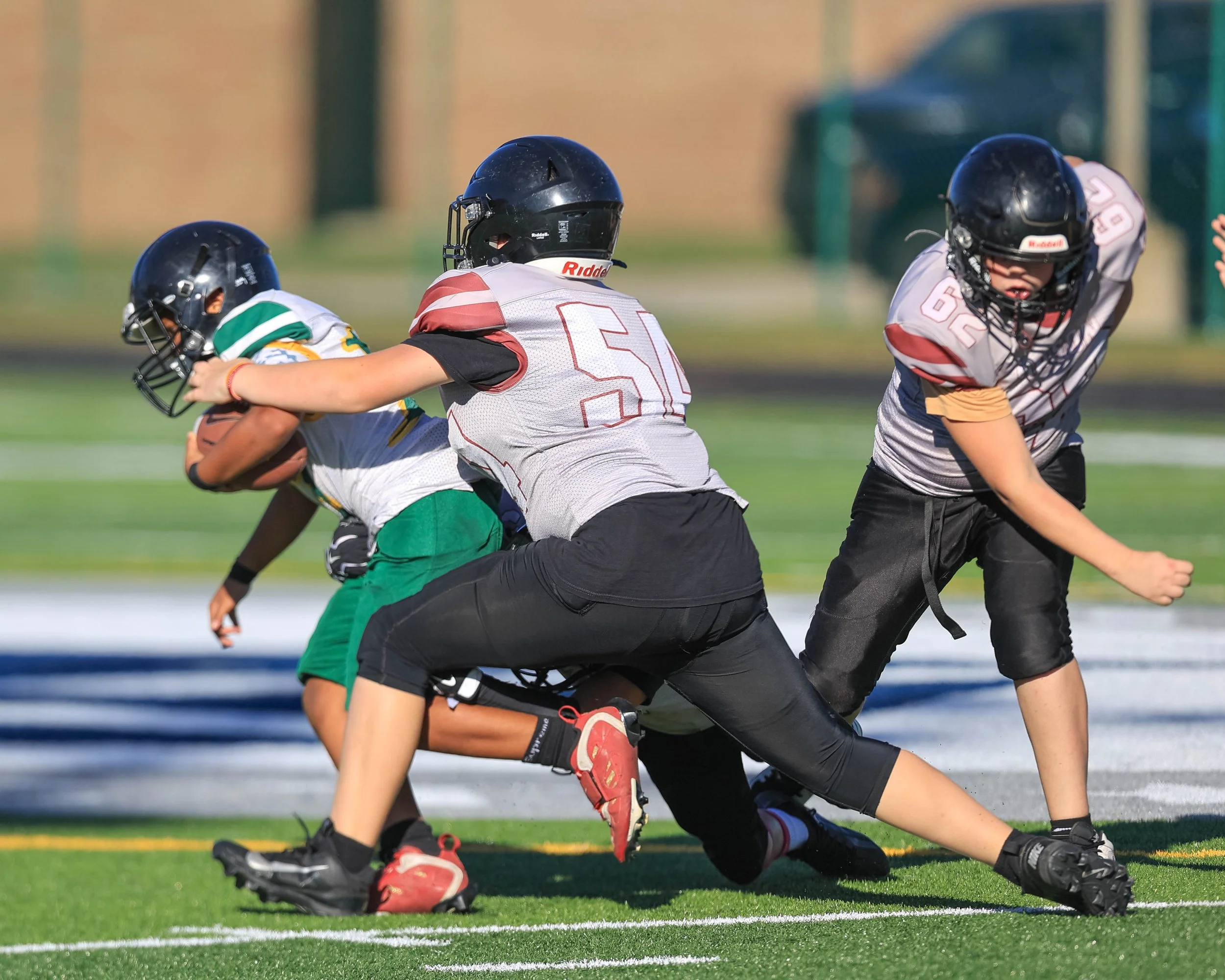 Pierce #11 tackled by Mason #54