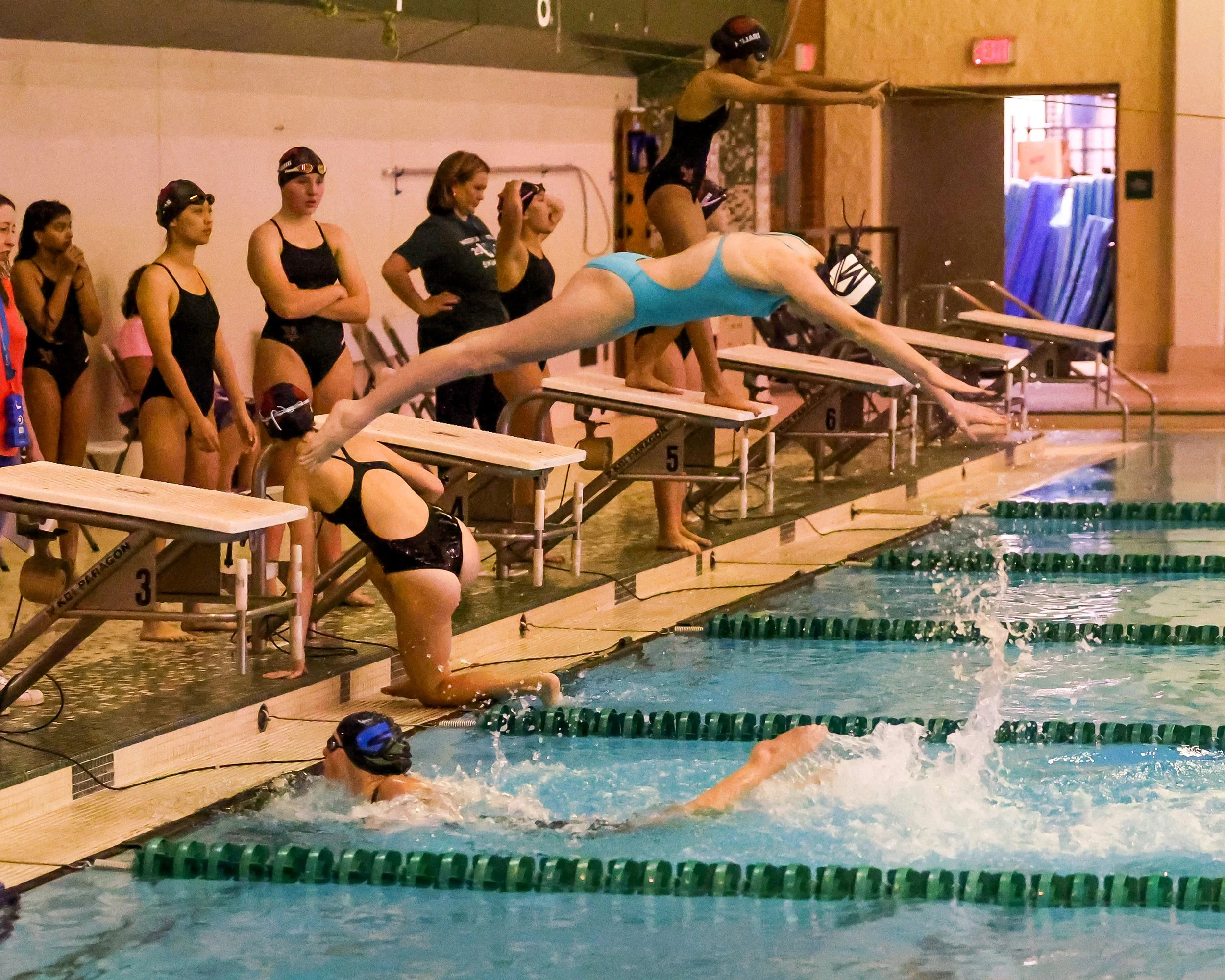 Next WU swimmer starting the race