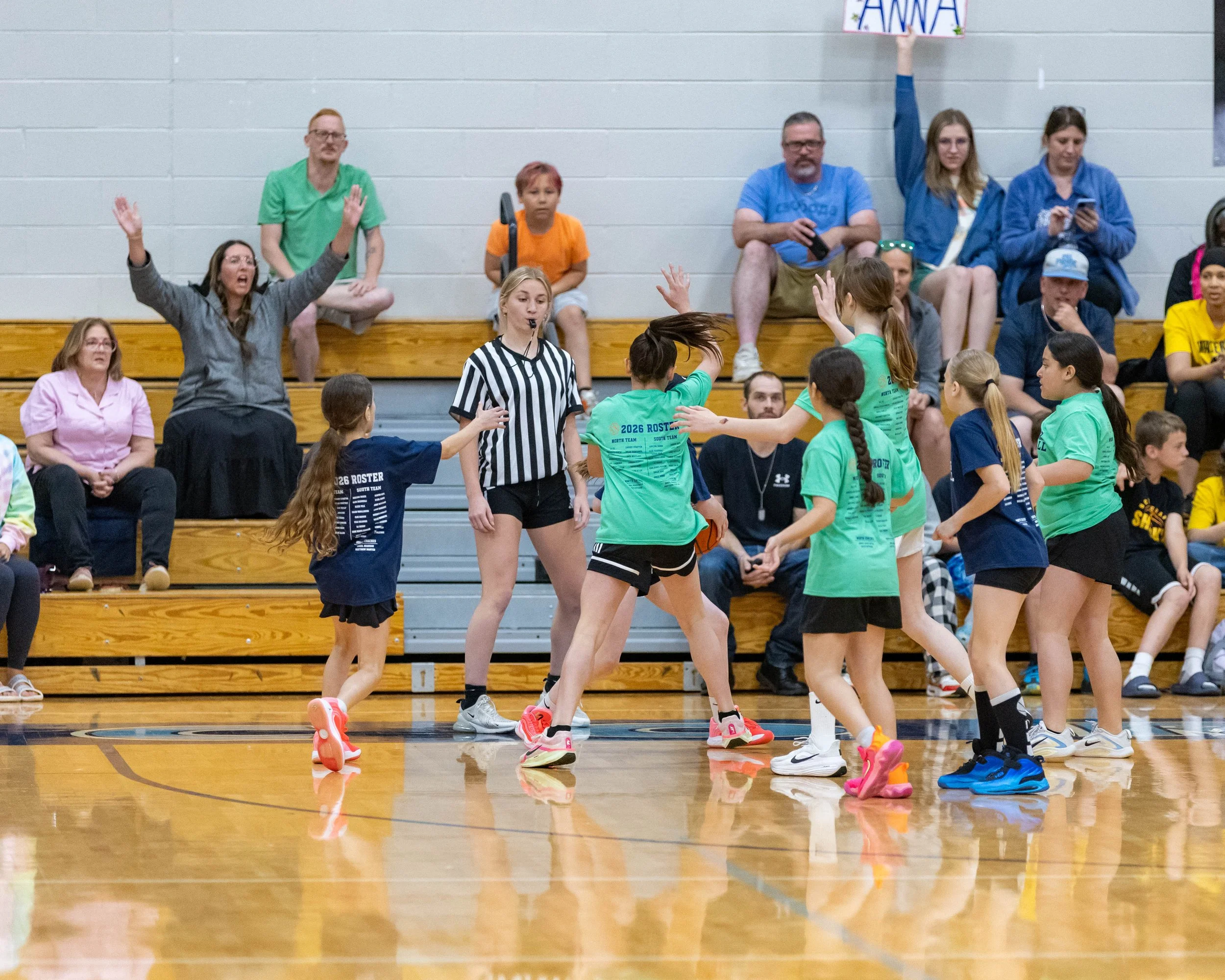 North girl surrounded by South players