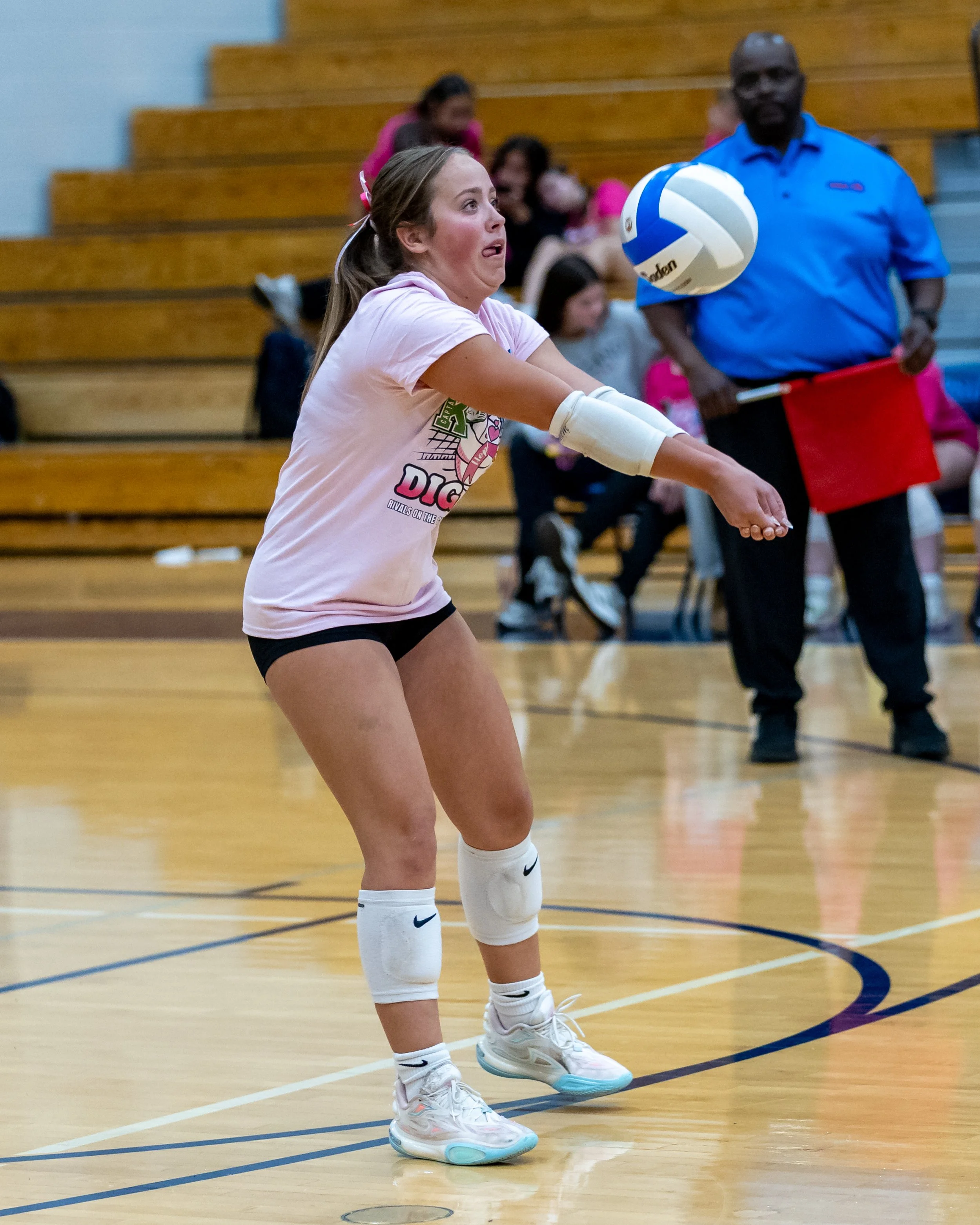 Kettering player hits the ball