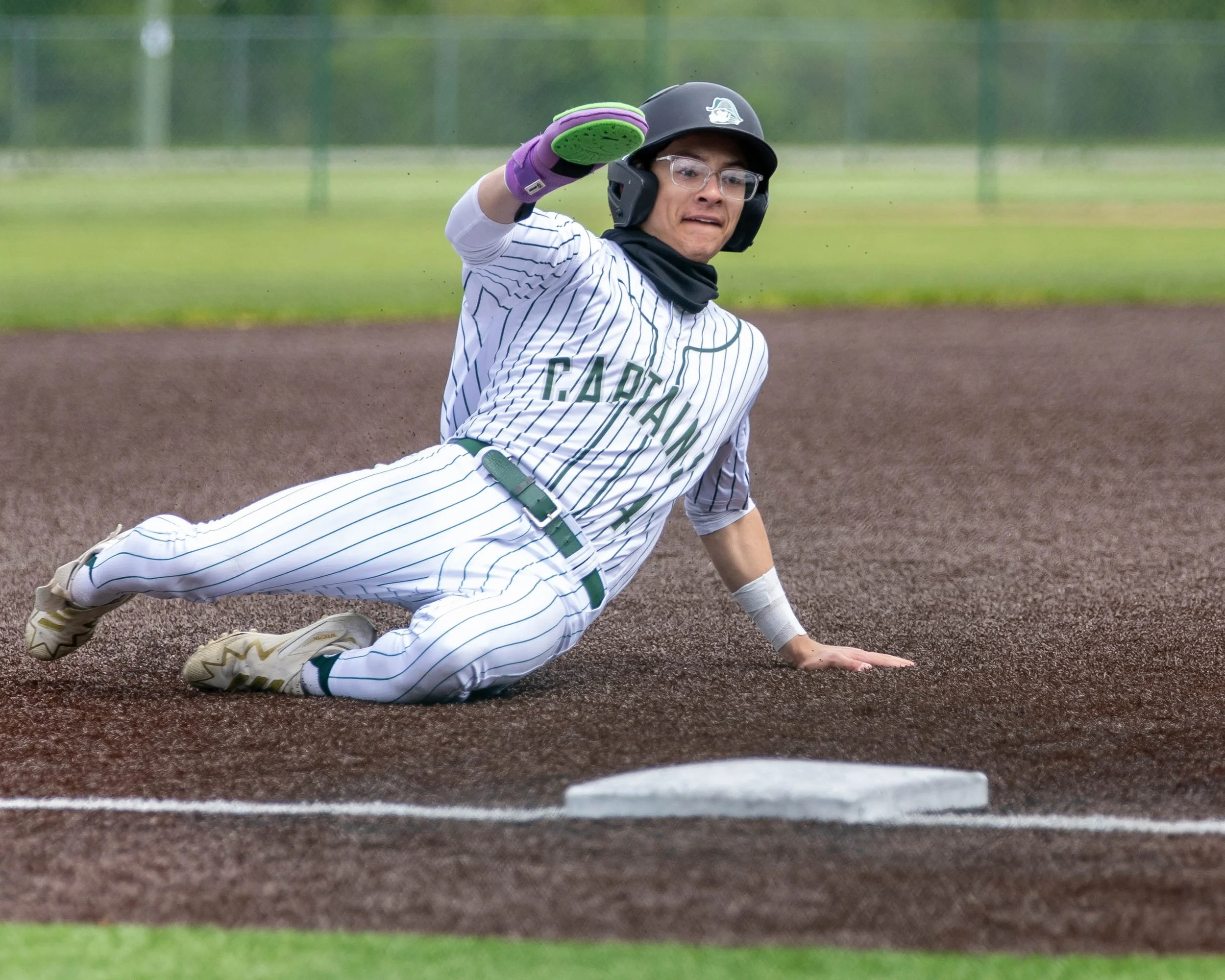 Kettering #4 slides into 3rd base
