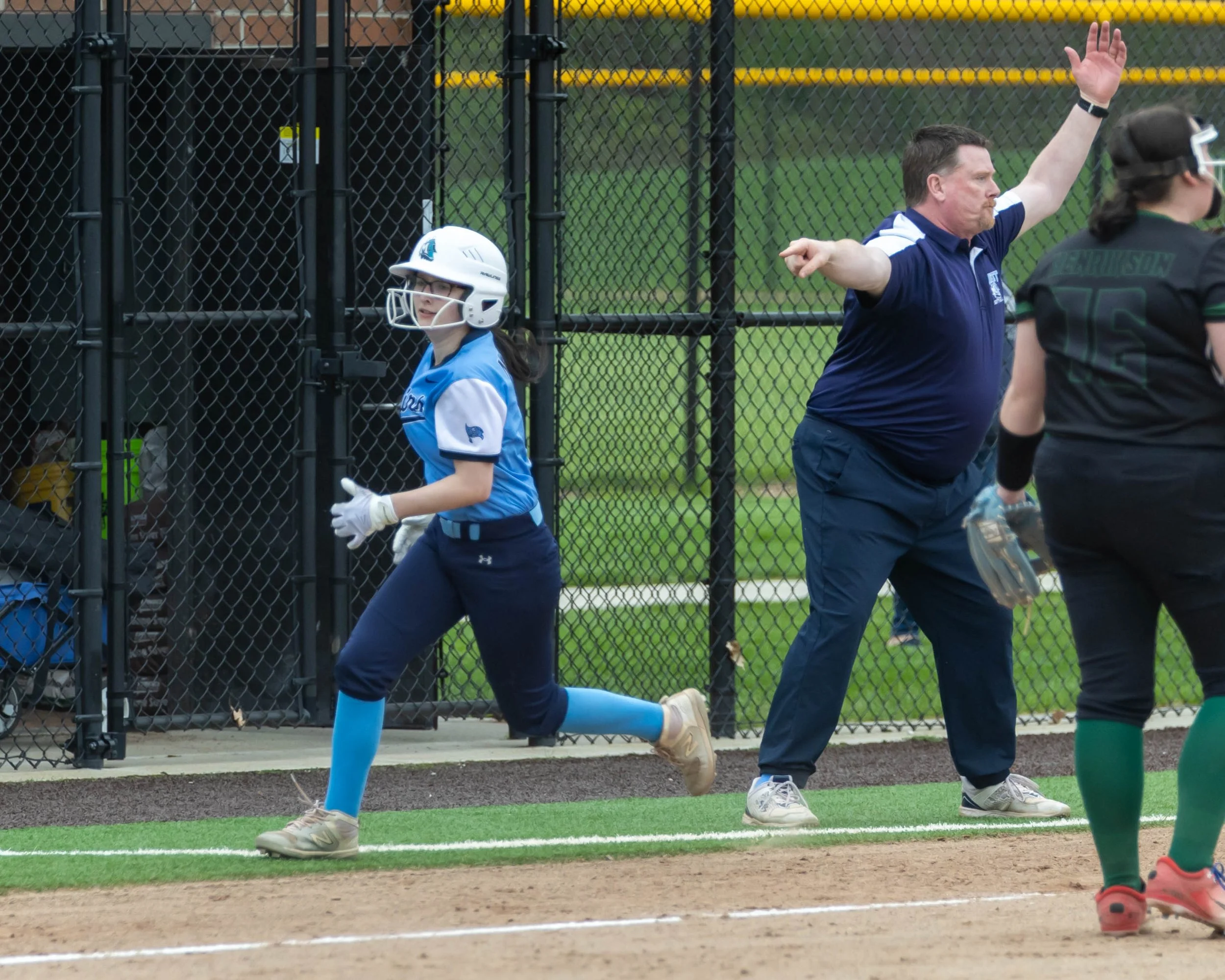 Mott runner rounds third base