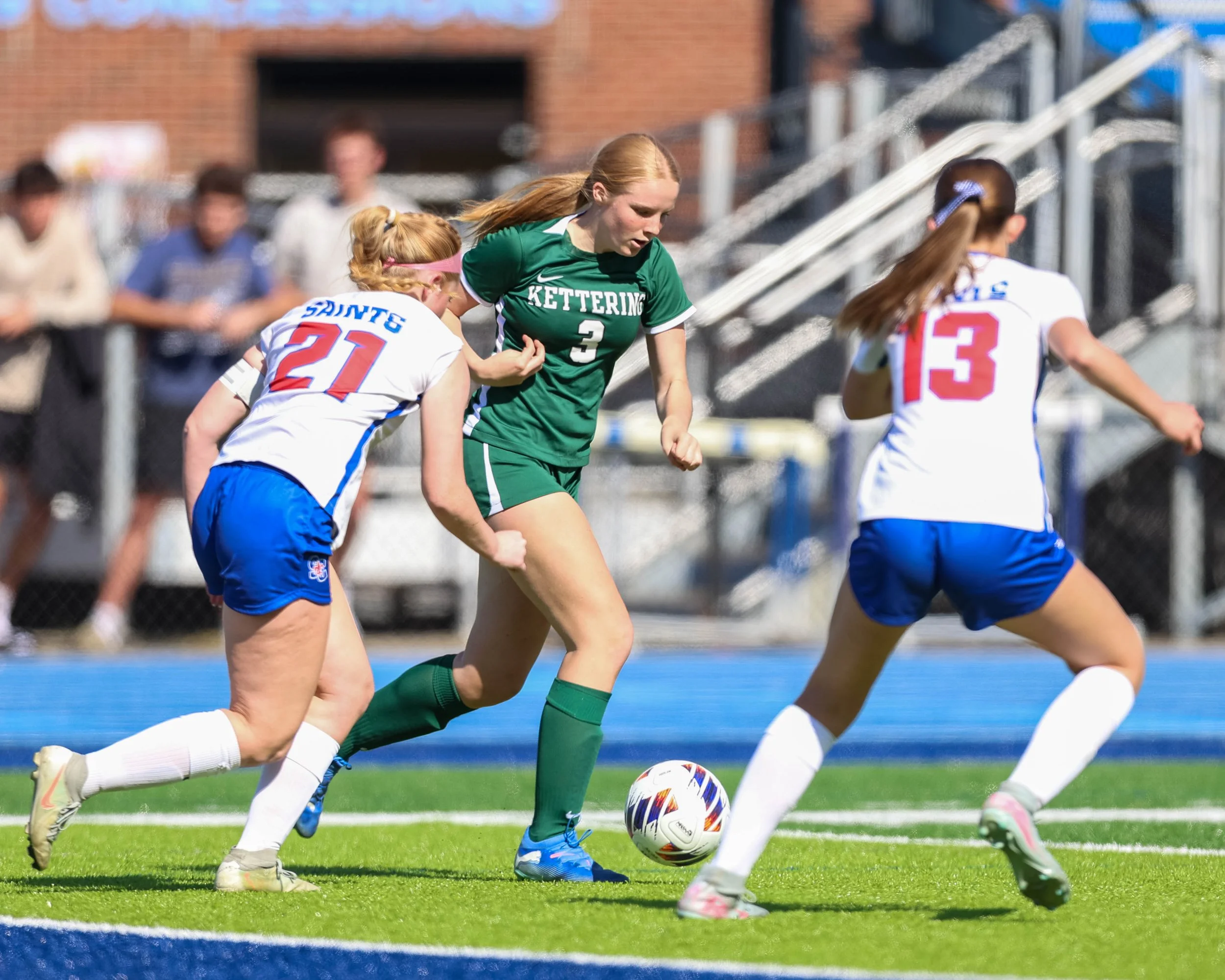 #3 with the ball with to defenders