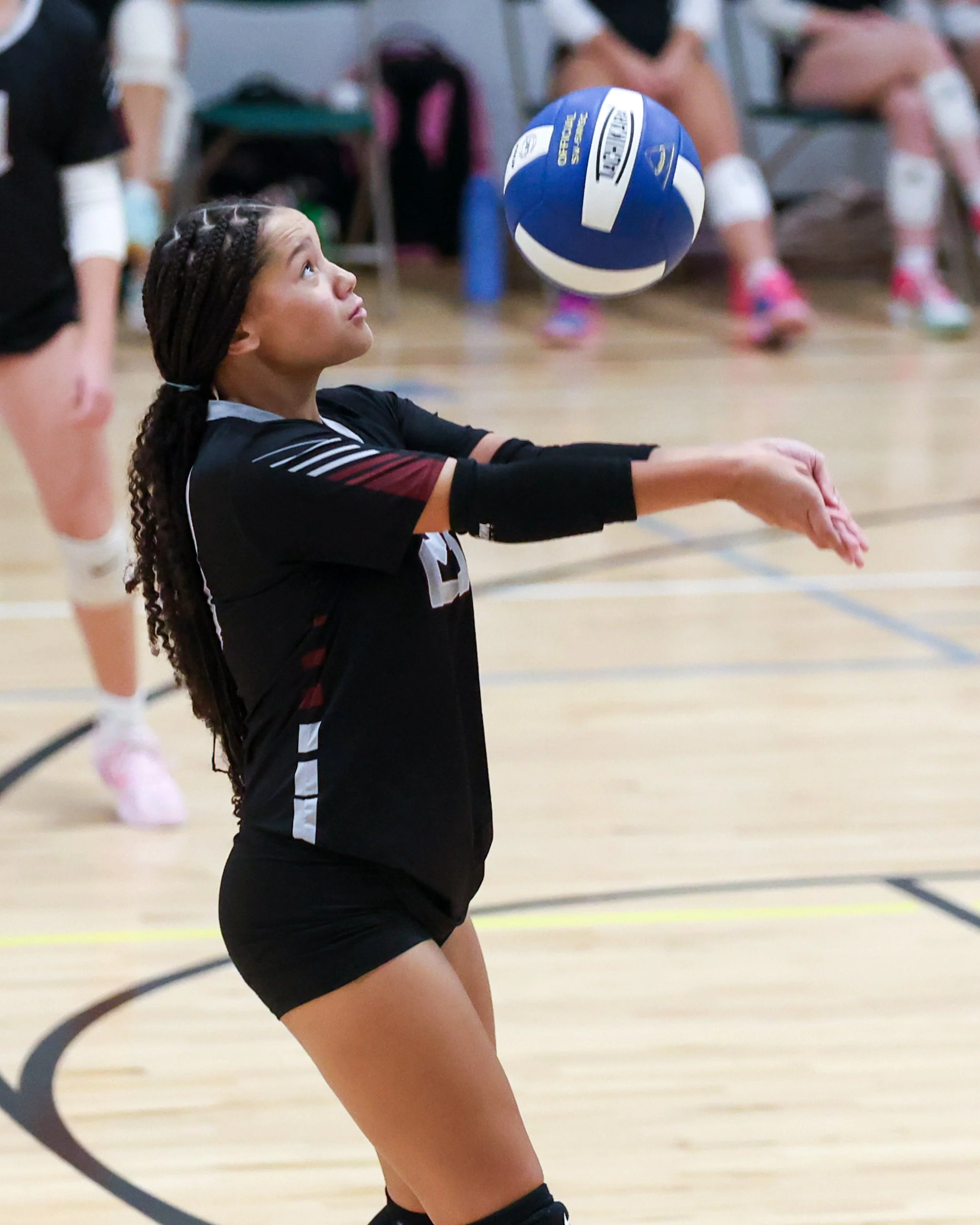 Mason girl returns the ball