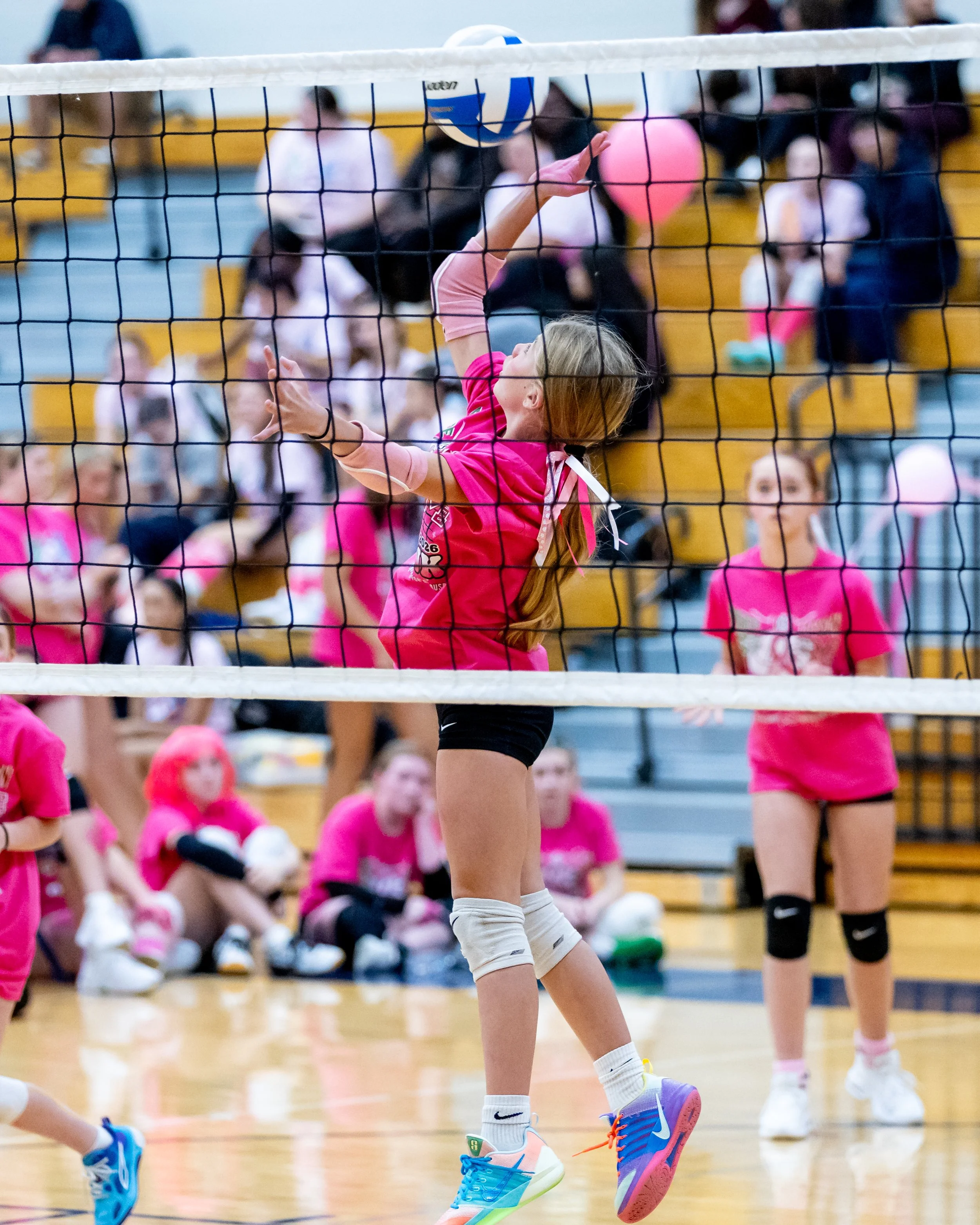 Pierce player hits the ball