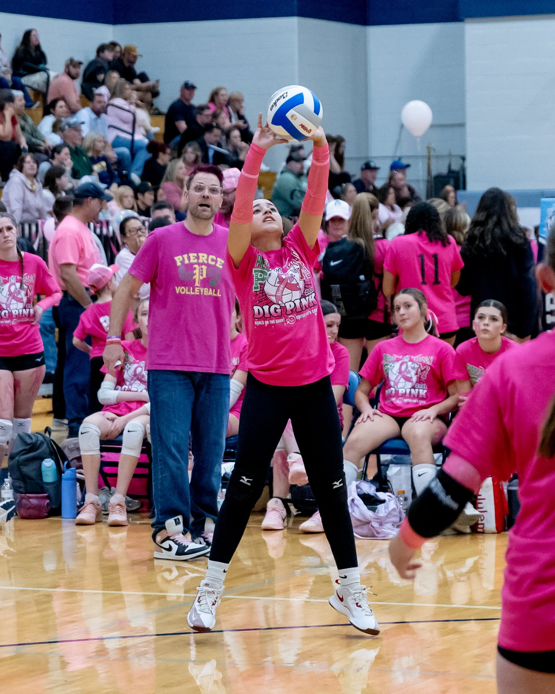 Pierce player hits the ball